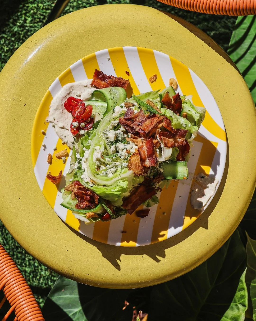 Light, bright and perfectly Sunnies. Meet the new Sunnies Wedge.⁠
Crisp iceberg lettuce with cherry tomatoes, shaved cucumber, crispy onions, and bacon, topped with smoked blue cheese and drizzled with avocado ranch ☀️ ⁠
⁠
📷️ @ash.ventures