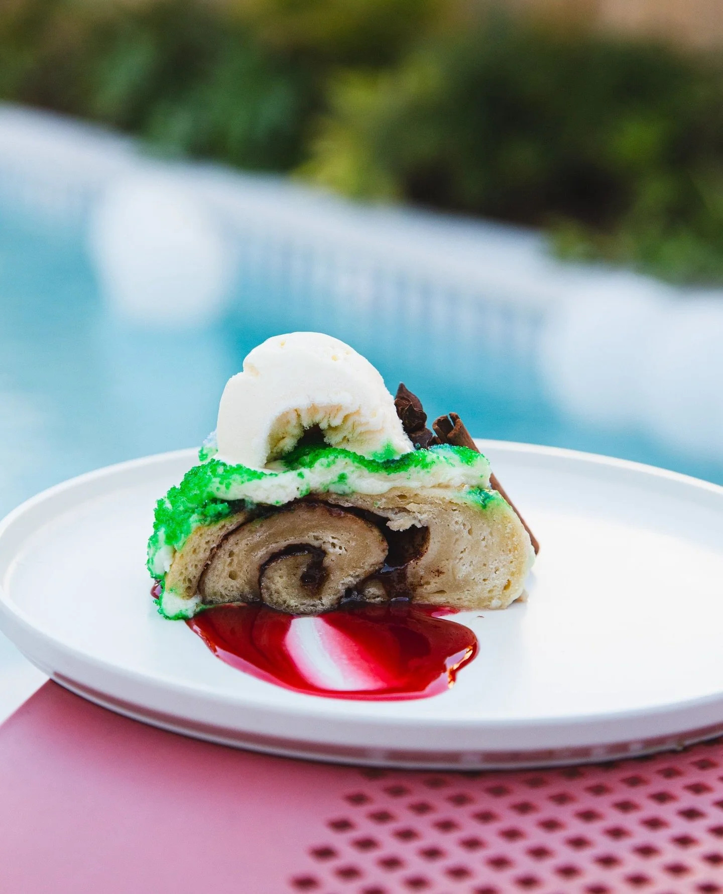 We&rsquo;ve got by the slice King Cake at Sunnies. Shoutout to our nextdoor Freret Street neighbors at @cinnaholicnola for making it happen.⁠
⁠
Made with their fresh cinnamon rolls and topped with old school frosting + purple, gold, and green sprinkl