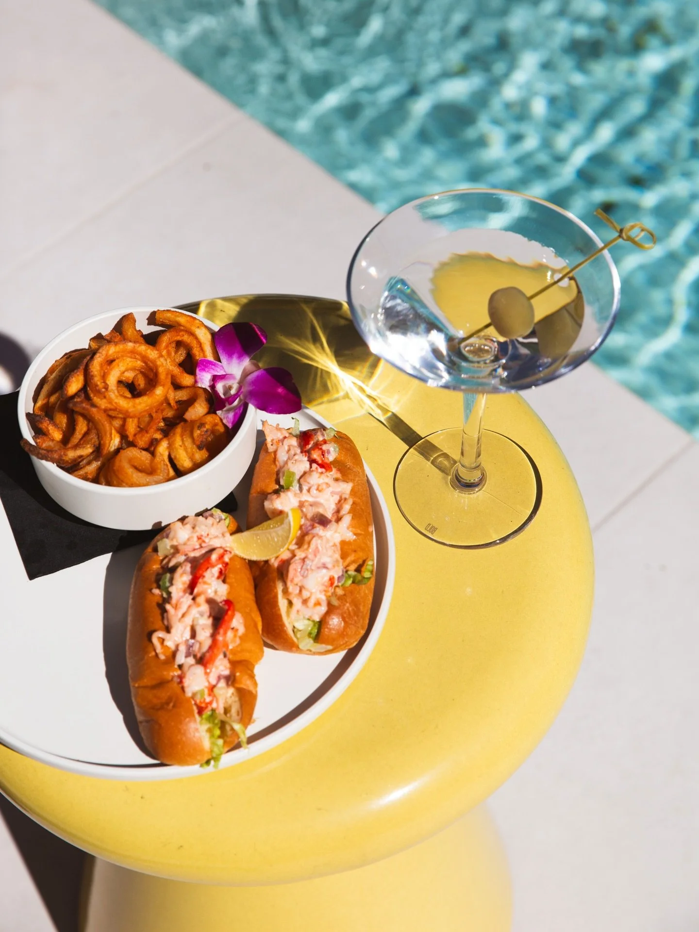 The Sunnies version of a Happy Meal.⁠ 🍟
Lobster &amp; Shrimp Rolls, curly fries, and a classic cocktail⁠
Available Mondays all day for $25