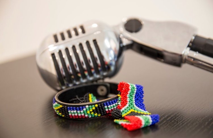Thanda Gumede's mic and traditional bracelets.