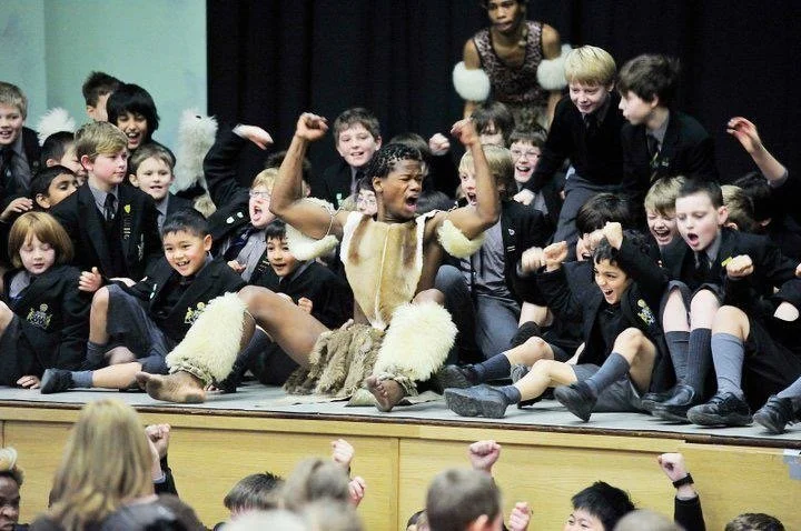 Thanda Gumede leading a Zulu dance workshop at a school somewhere in U.K., location undisclosed for safeguarding.