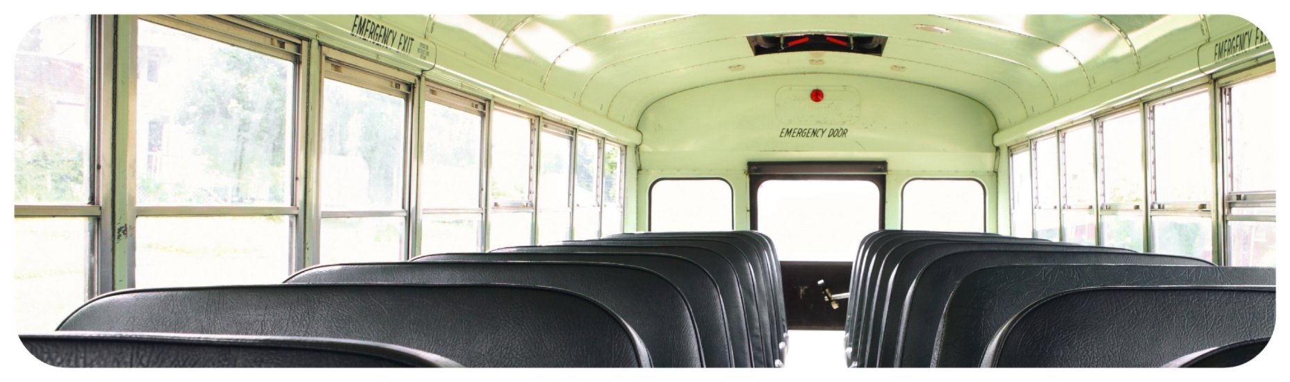 Empty school bus interior in Iowa illustrating school transportation safety and liability concerns.