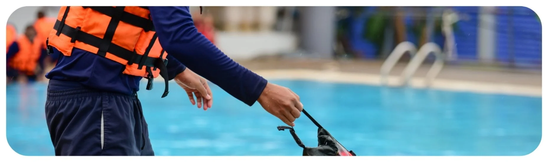 Lifeguard monitoring swimmers at an Iowa pool emphasizing child swimming pool safety and accident prevention.