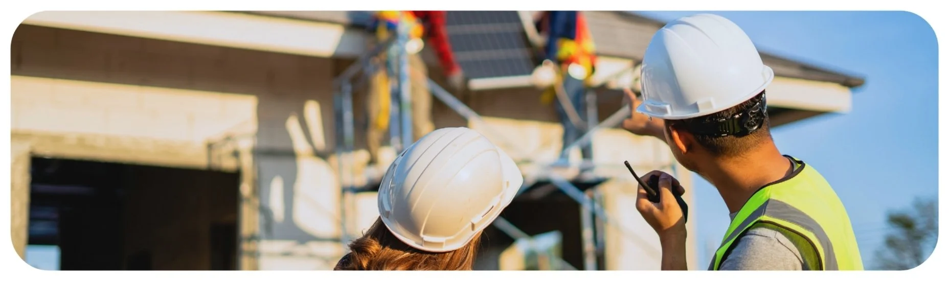 Construction workers supervising elevated work, representing Iowa coworker gross negligence cases involving reckless jobsite supervision and failure to warn.