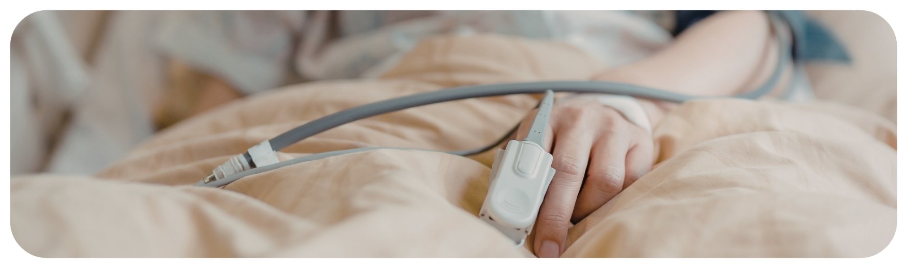 Hospital patient receiving medical monitoring, representing Iowa medical malpractice cases involving preventable injury and negligent care.
