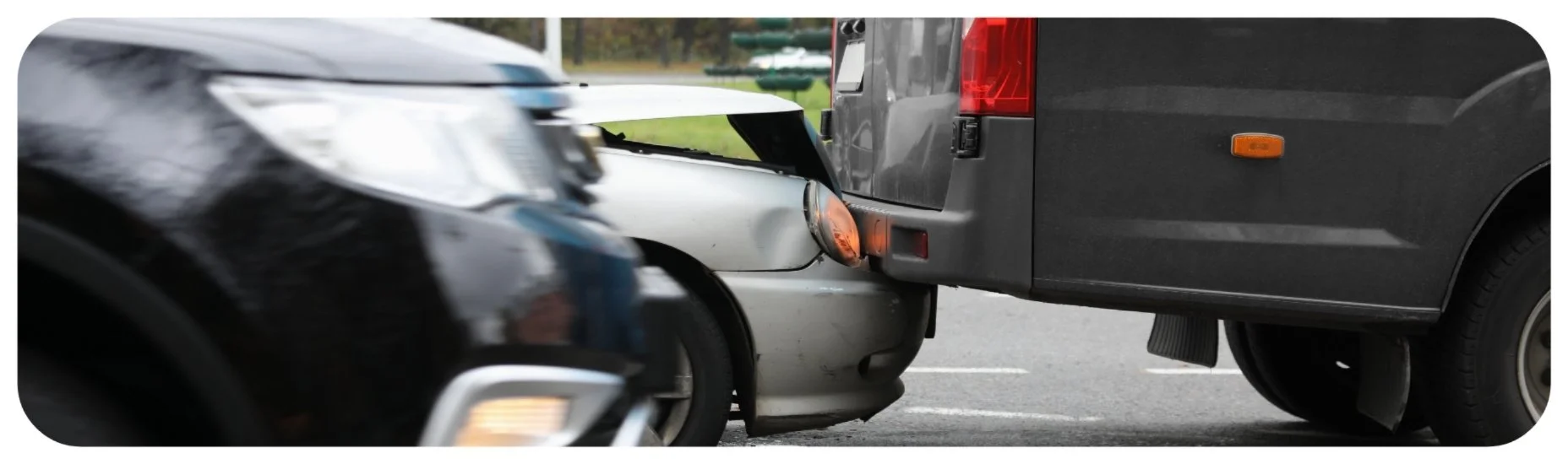 Rear-end car accident in Iowa involving damage to multiple vehicles.