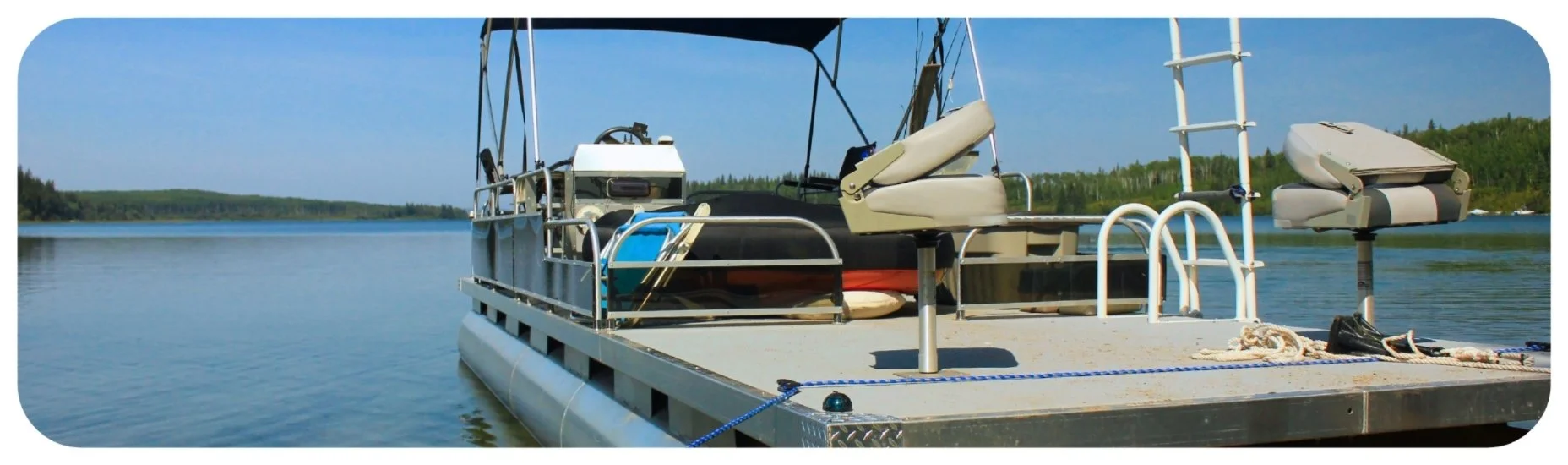 Pontoon boat on an Iowa lake, representing boating accidents involving passenger injuries and unsafe conditions on board.
