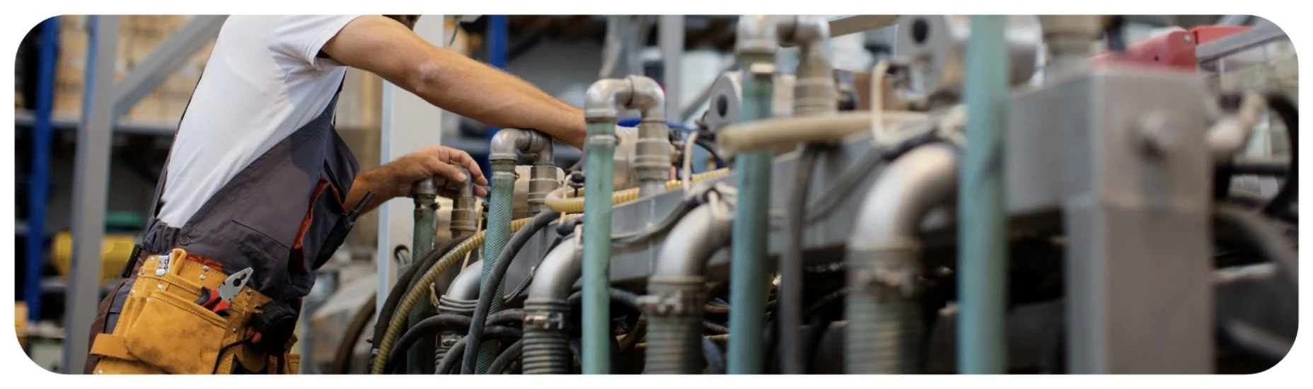 Worker operating industrial machinery in an Iowa workplace.