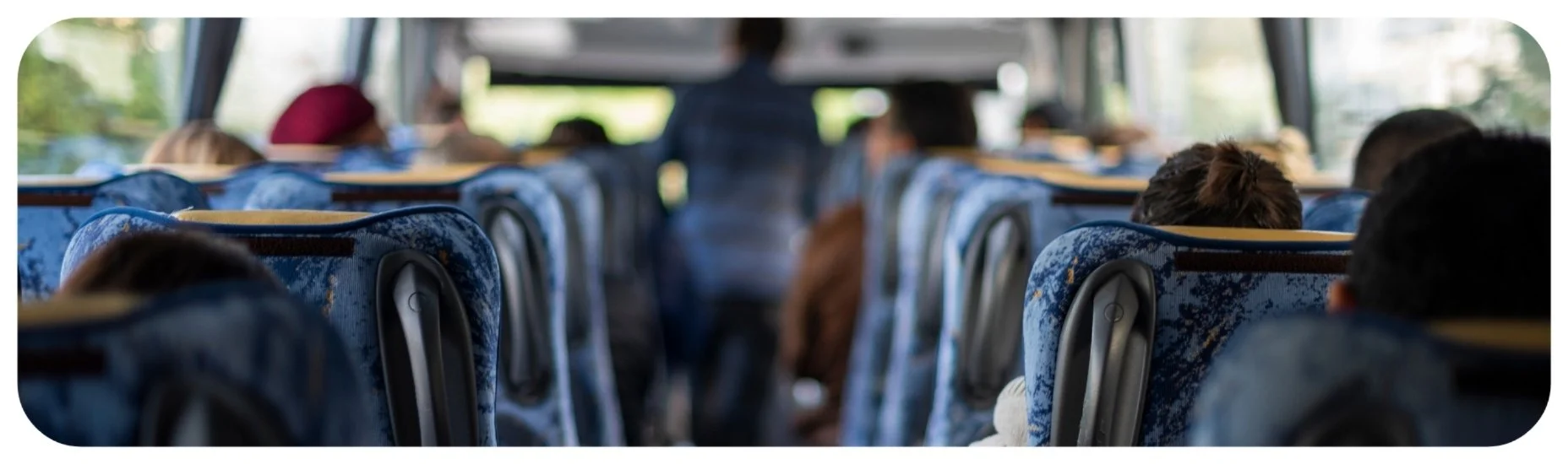Passengers seated inside a bus, representing Iowa bus accident and passenger injury cases.