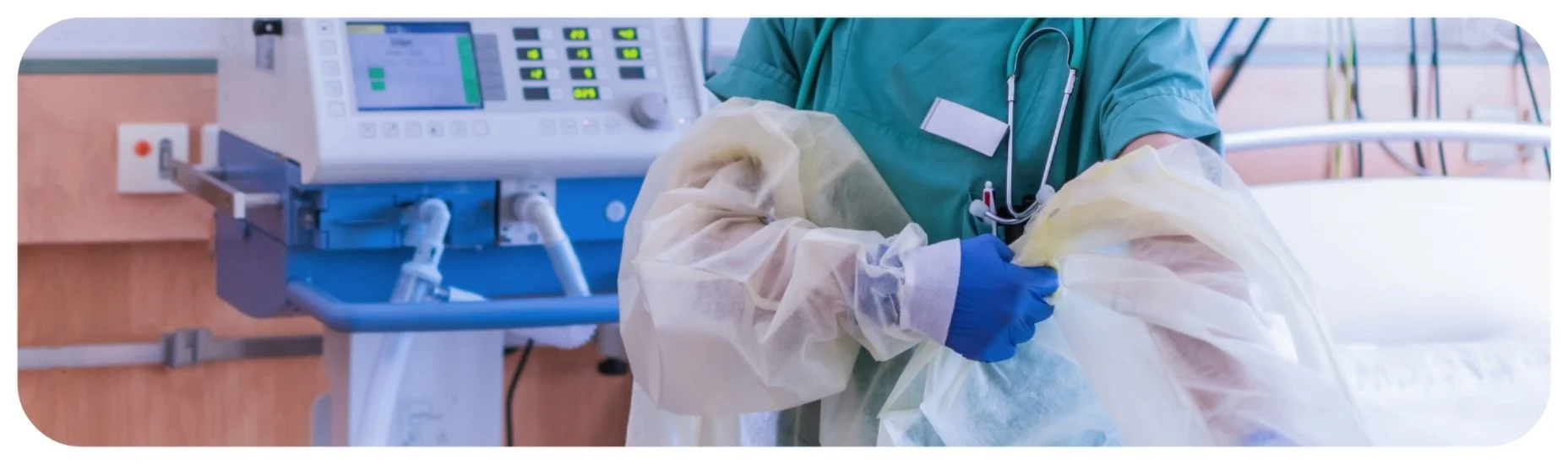 Healthcare professional putting on protective gear in a hospital room, representing Iowa medical malpractice and negligent medical care cases.