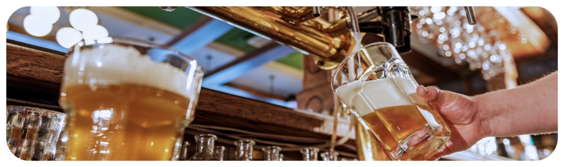 Bartender pouring beer from a tap, representing Iowa dram shop liability and overserving alcohol claims.