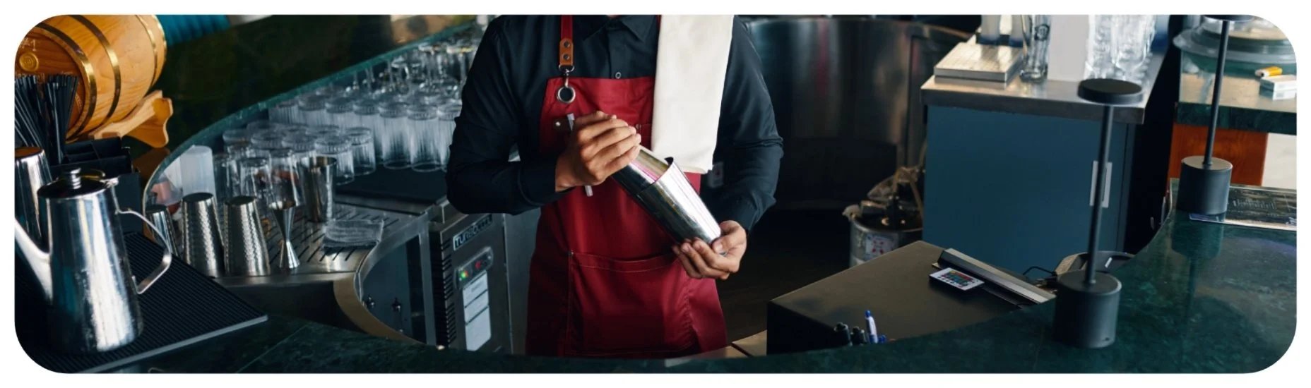 Bartender preparing drinks, representing Iowa dram shop litigation involving overserving alcohol and failure to monitor intoxicated patrons.