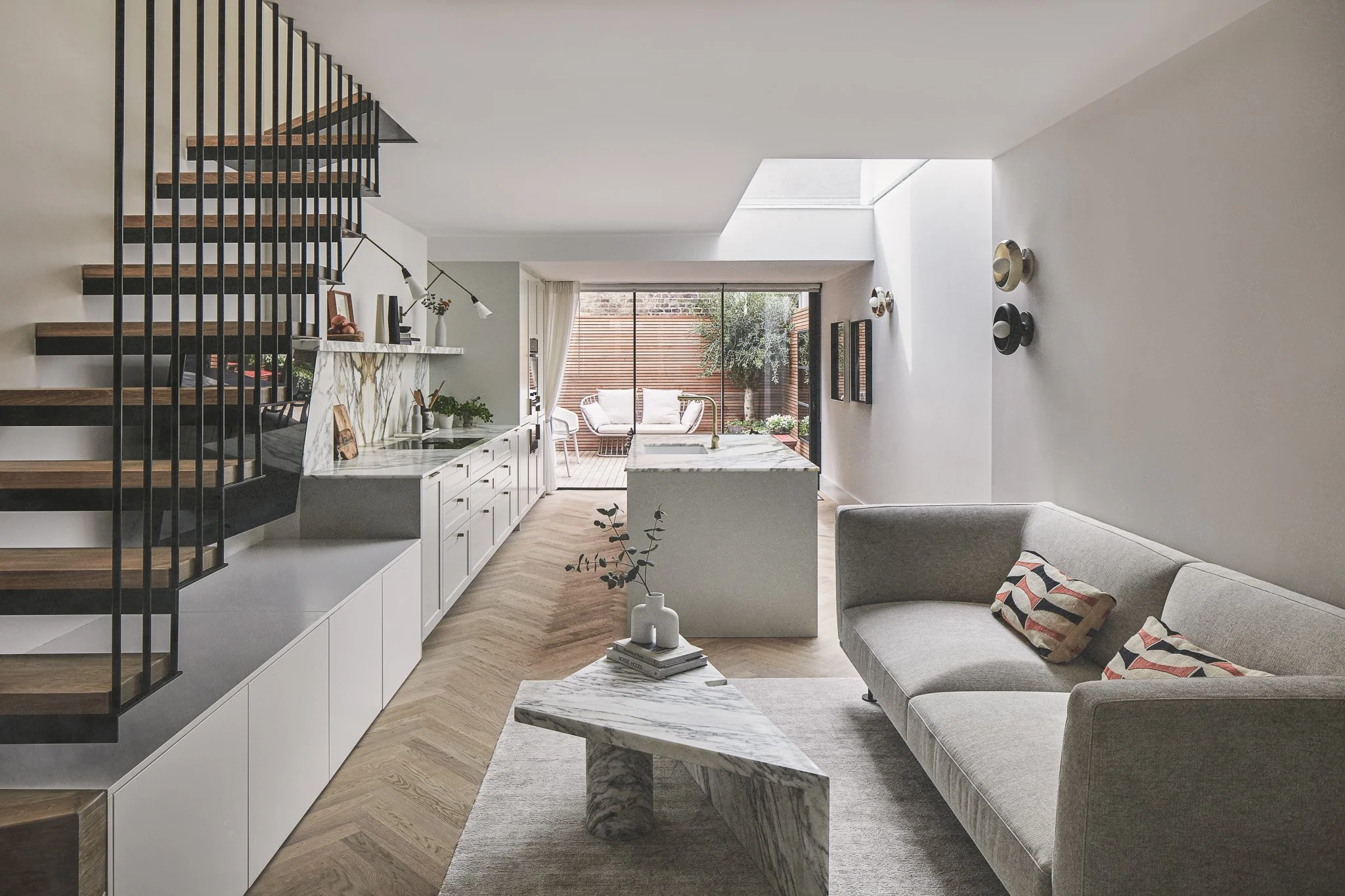 Reconfigured staircase improving daylight and circulation in a Richmond cottage refurbishment