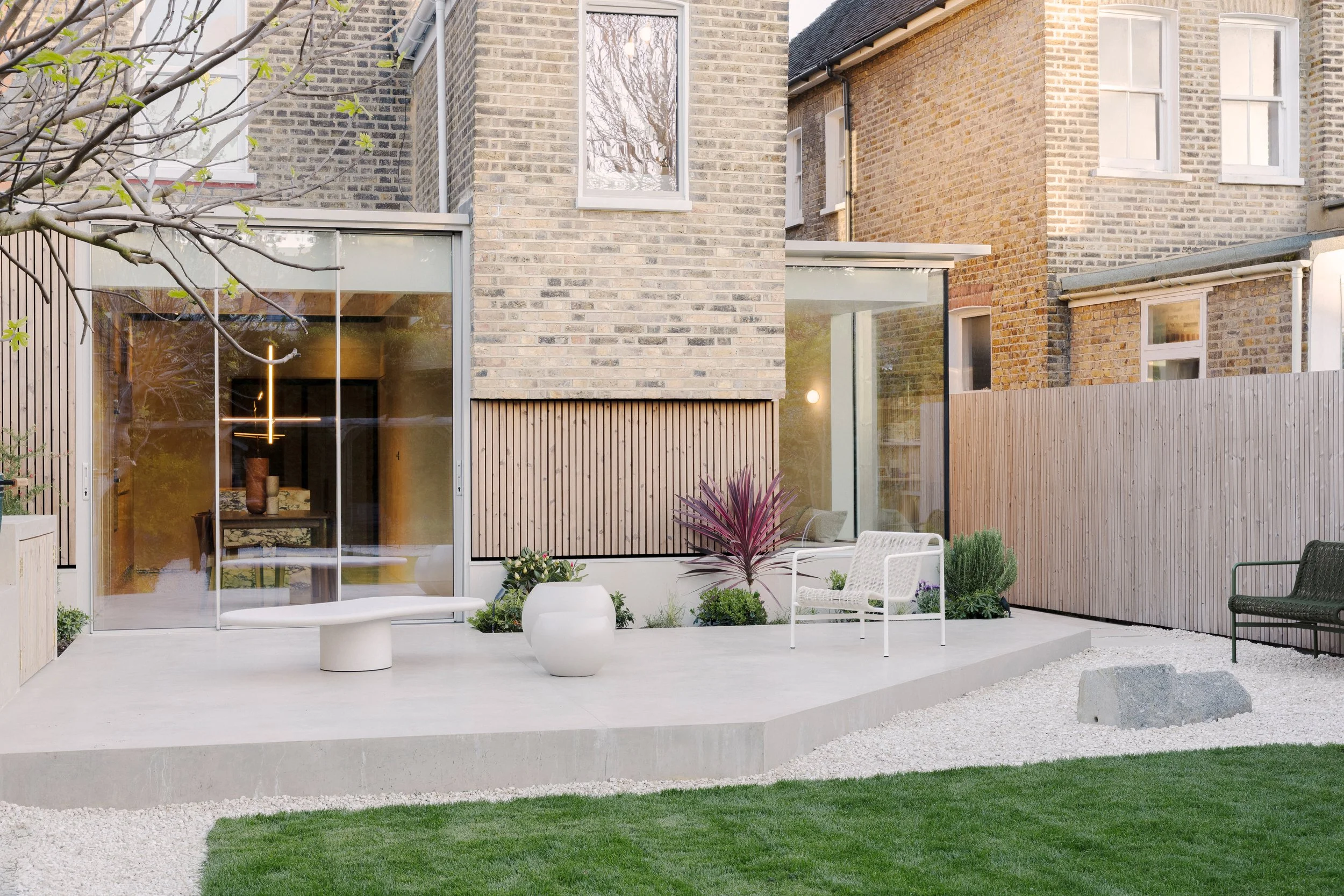 Rear extension improving natural light in Victorian house refurbishment London