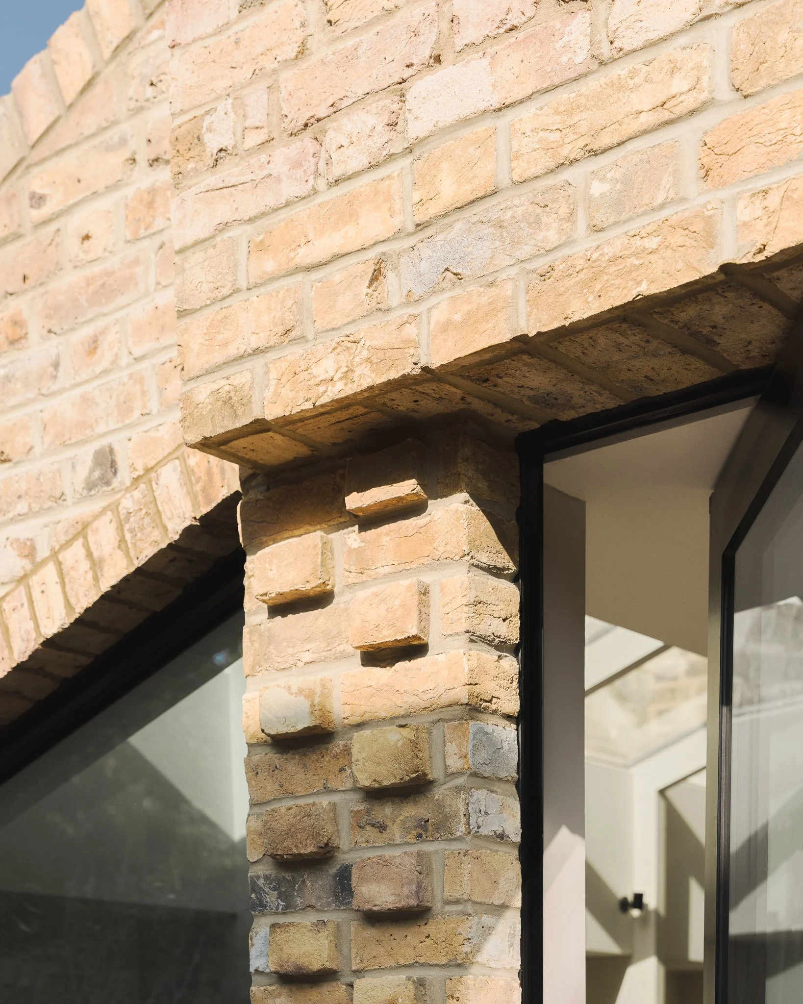 Retained London stock brickwork within a period house refurbishment