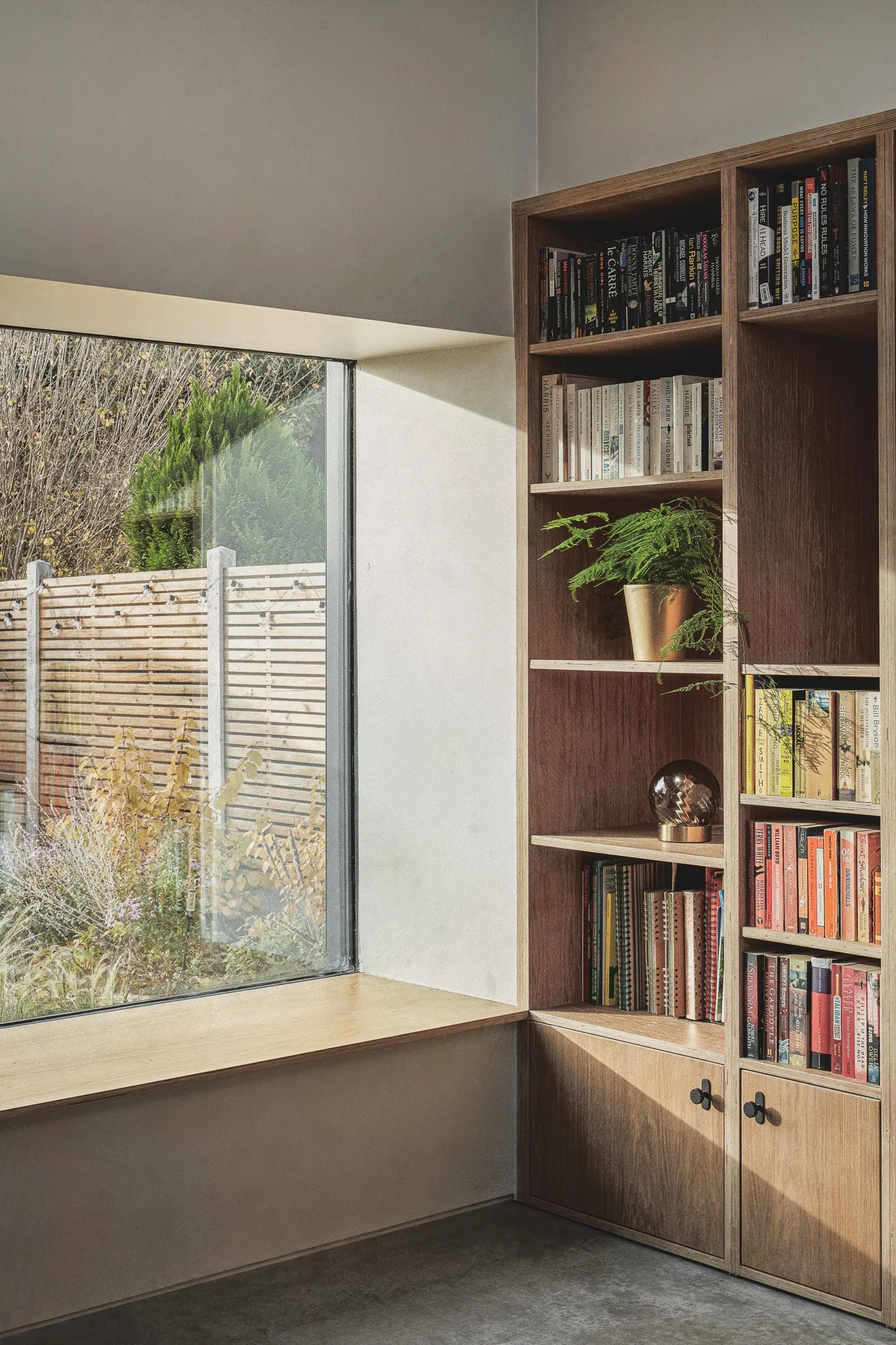 Natural materials such as brick and timber responding to daylight in interior space