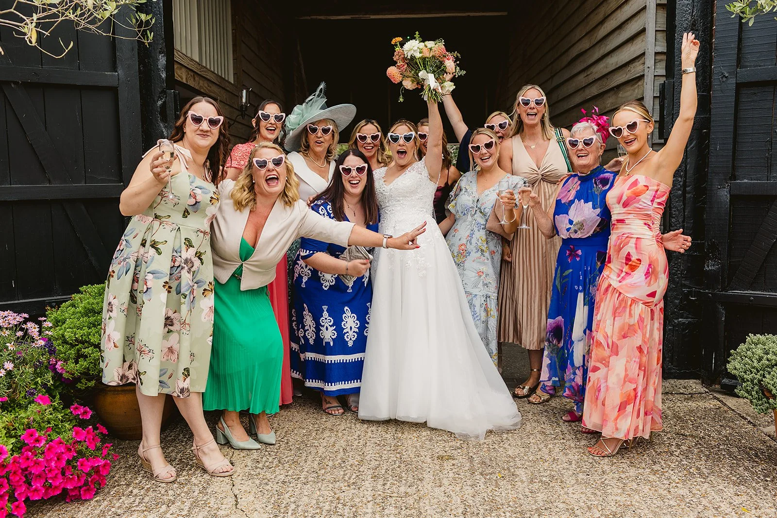 relaxed wedding group photo upwaltham barns