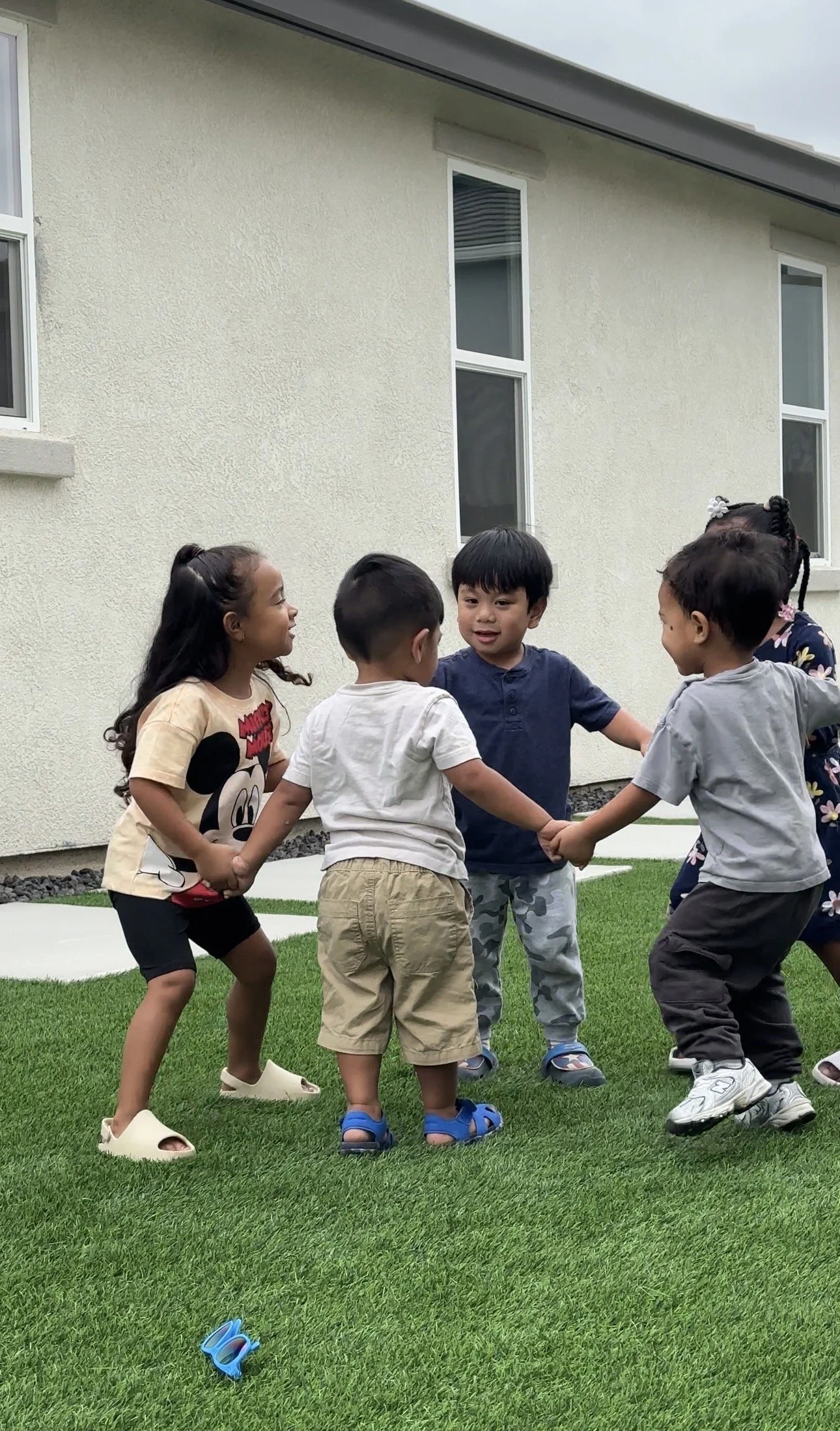 Young children learning through play activities at a home daycare in Elk Grove.