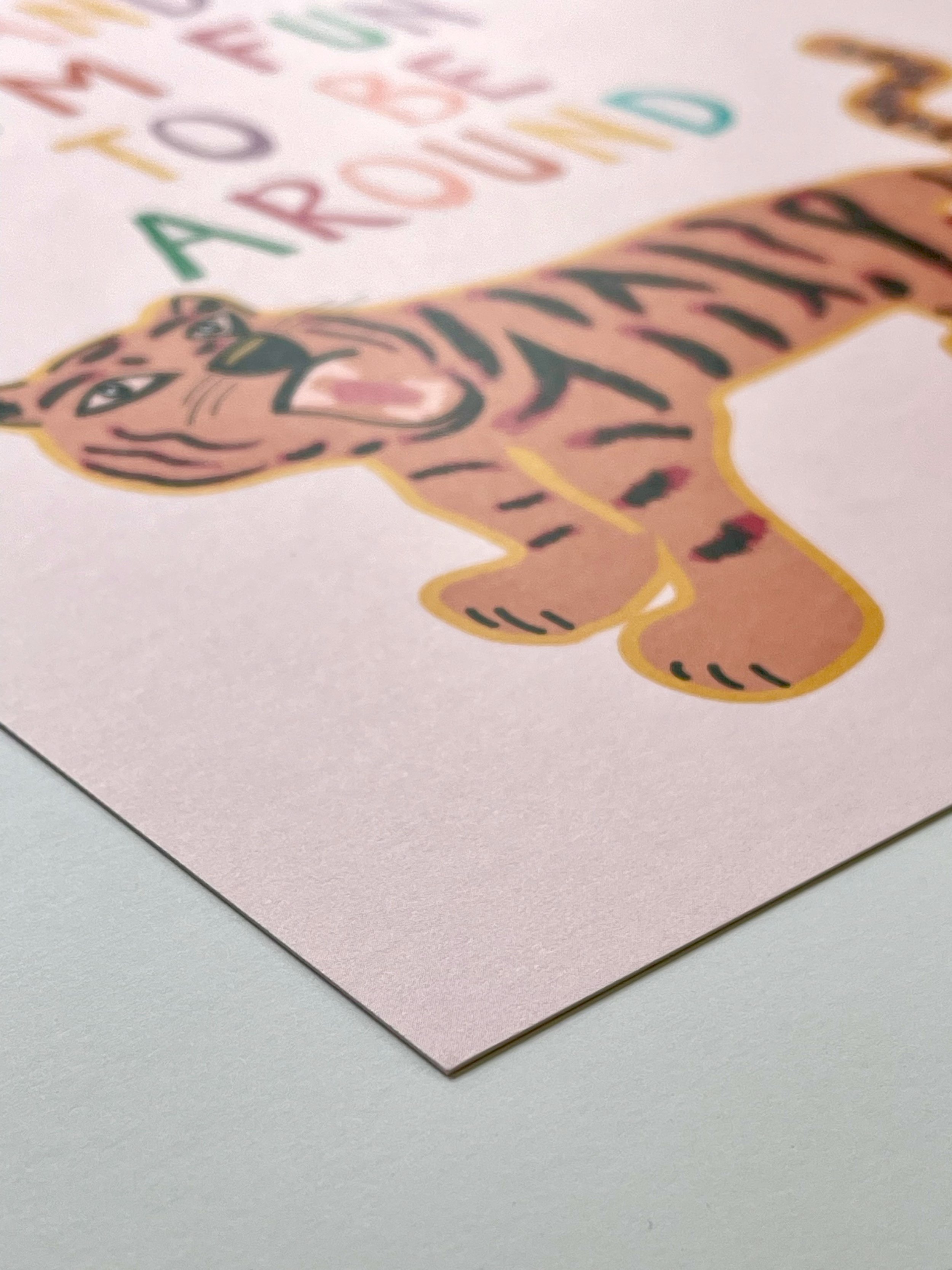 Art print details of an original illustration by KJ of a roaring tiger with diamonds in her tail, and hand lettering that reads I'm Cute and I'm Fun to be Around.