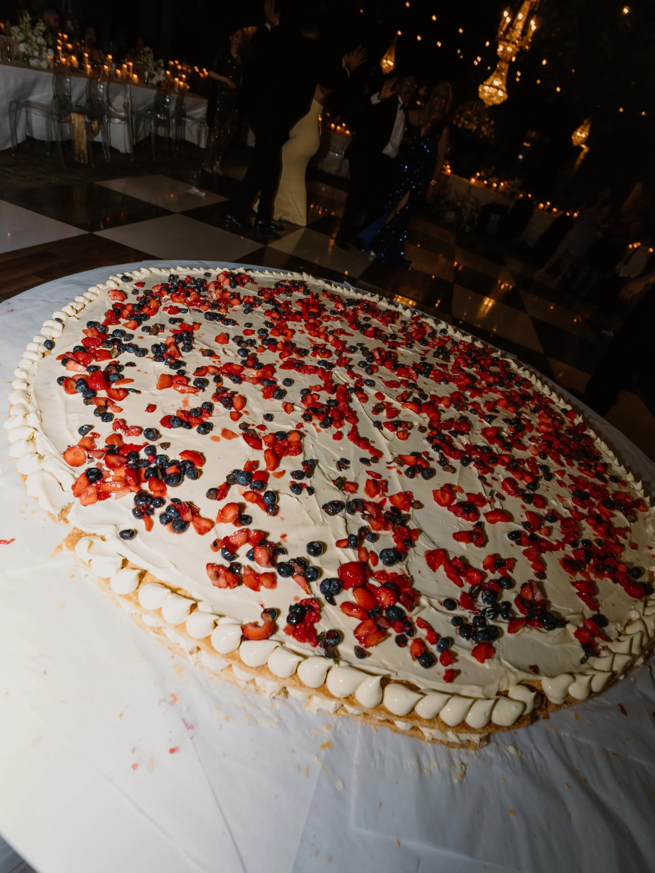 @poulsbakeryoc created this stunning Italian wedding cake right before the guests eyes! 
&bull;
Photographer: @tacheweddings 
Venue: @serraplaza 
Bakery: @poulsbakeryoc 
Coordinator: @herestothemevents 
Catering: @jayscatering 
Rentals: @sigpartyrent
