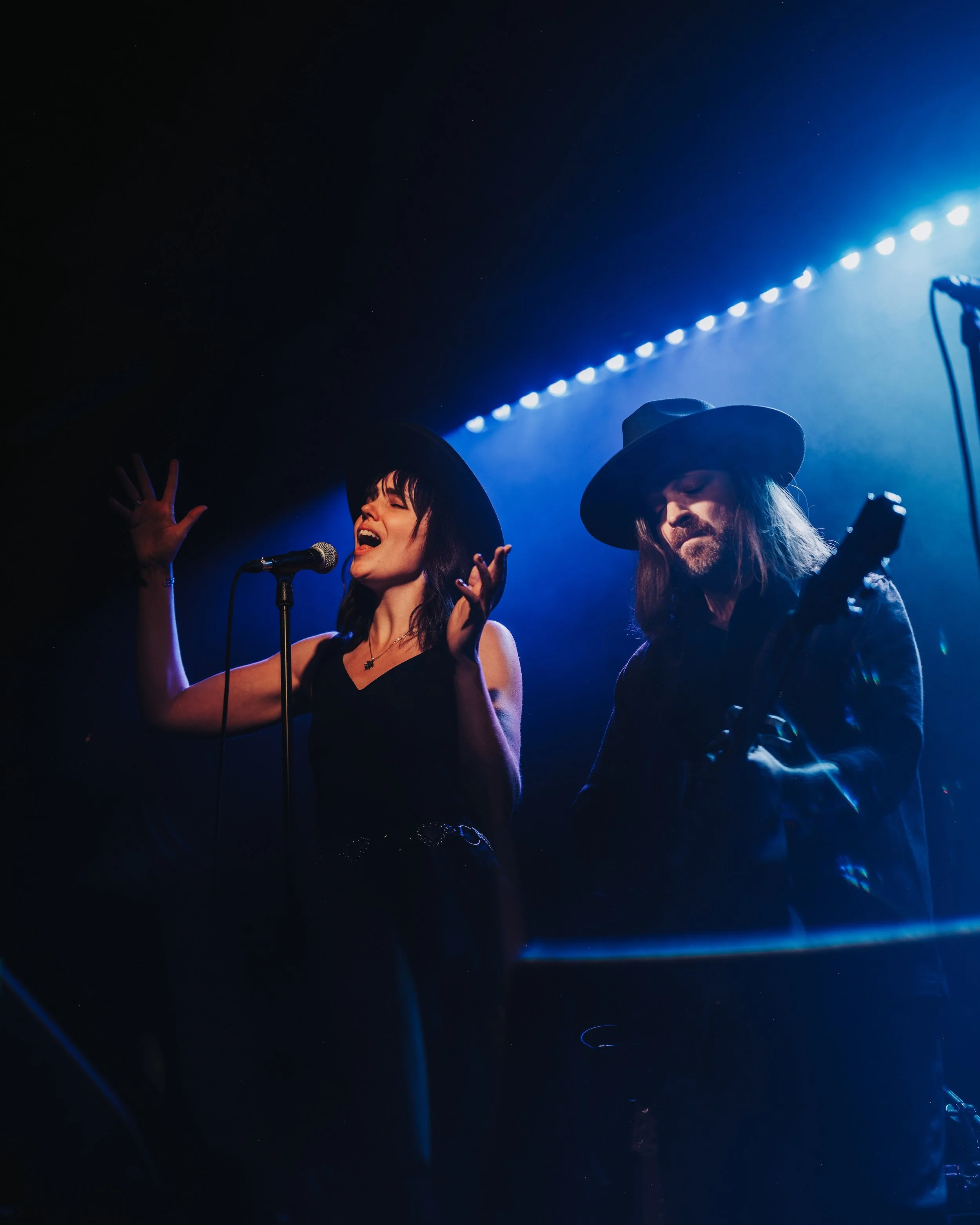 Satellite Birdhouse band members Stacy DuBois and Troy Huizinga performing live