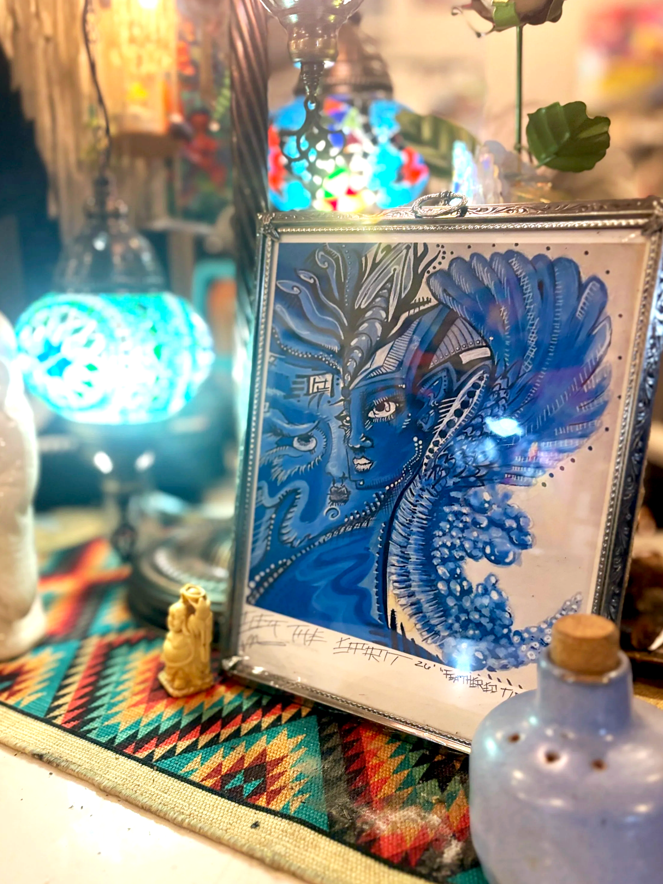 Tides of the Ancients framed archival art print by Sea The Spirit featuring a blue oceanic spirit figure with flowing wave and feather elements