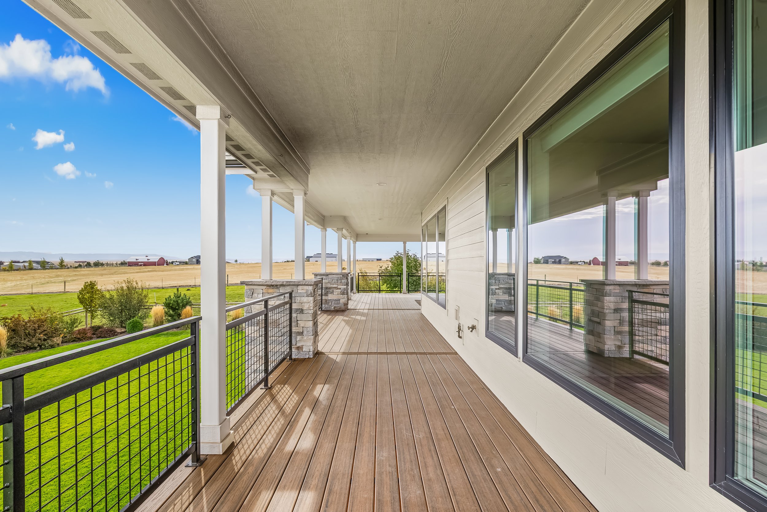 Covered deck with sweeping valley views