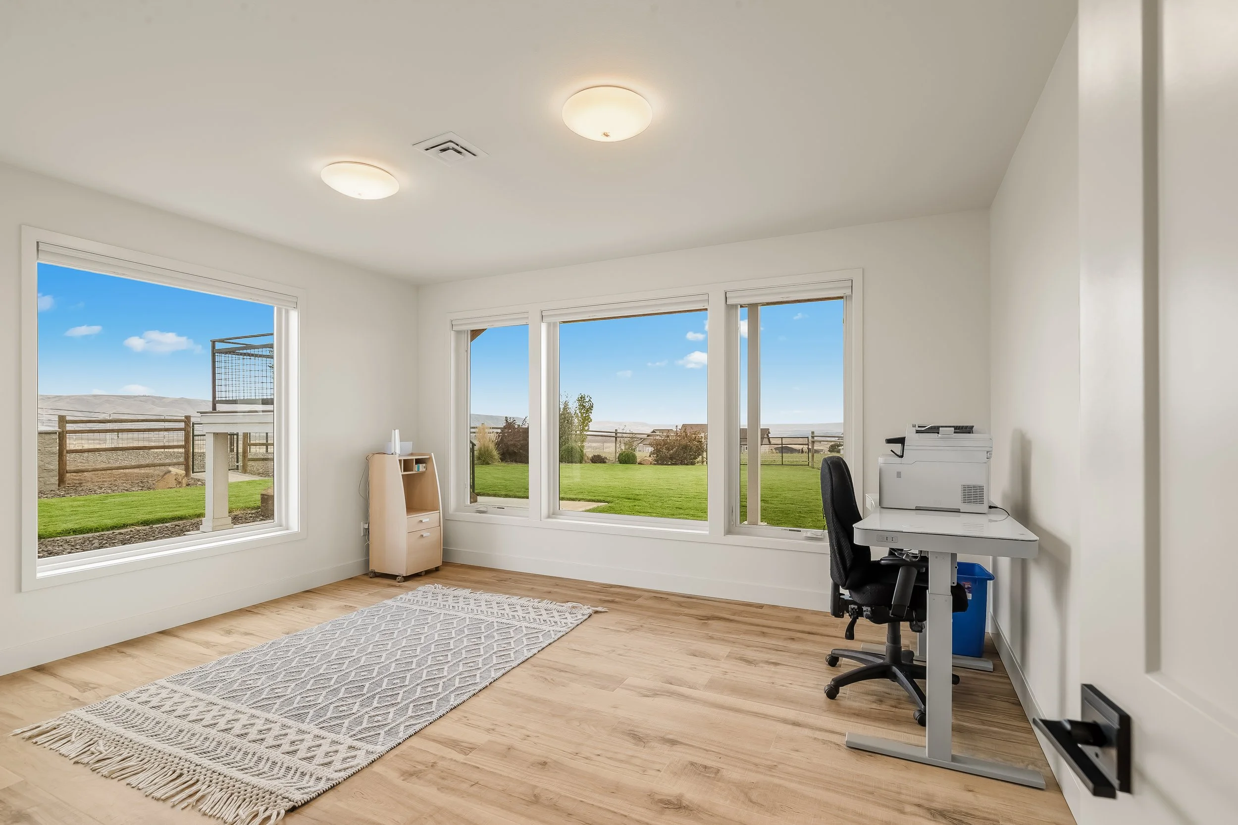Lower-level bedroom with daylight windows
