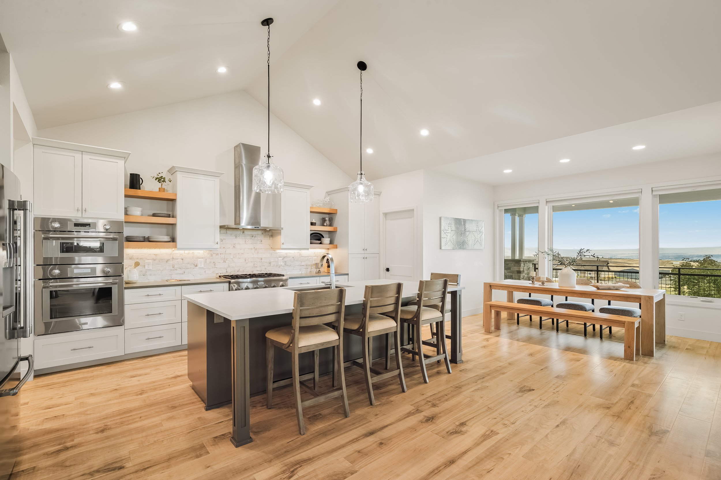 Kitchen island with quartz counters open to dining