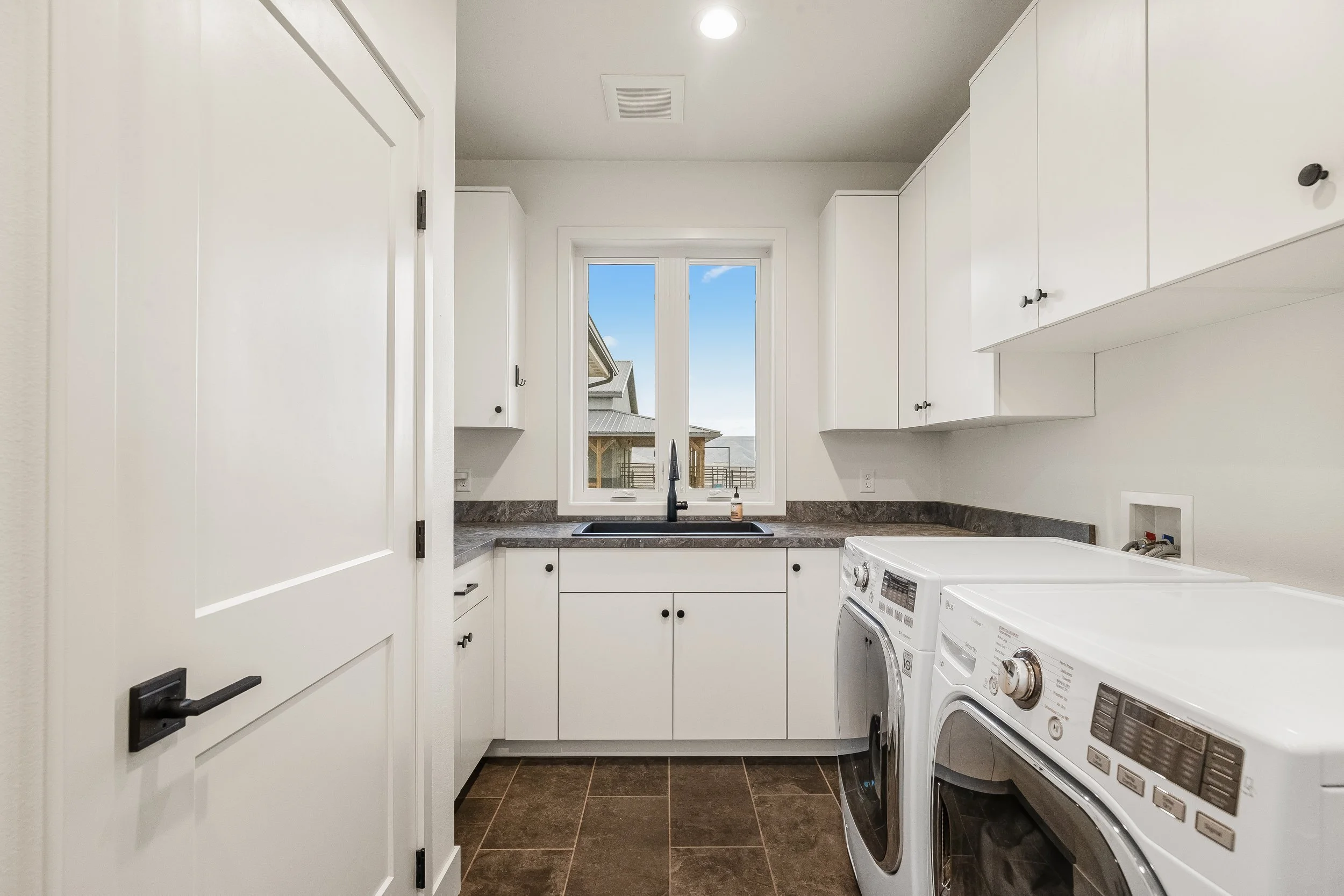 Main-level laundry with folding counter