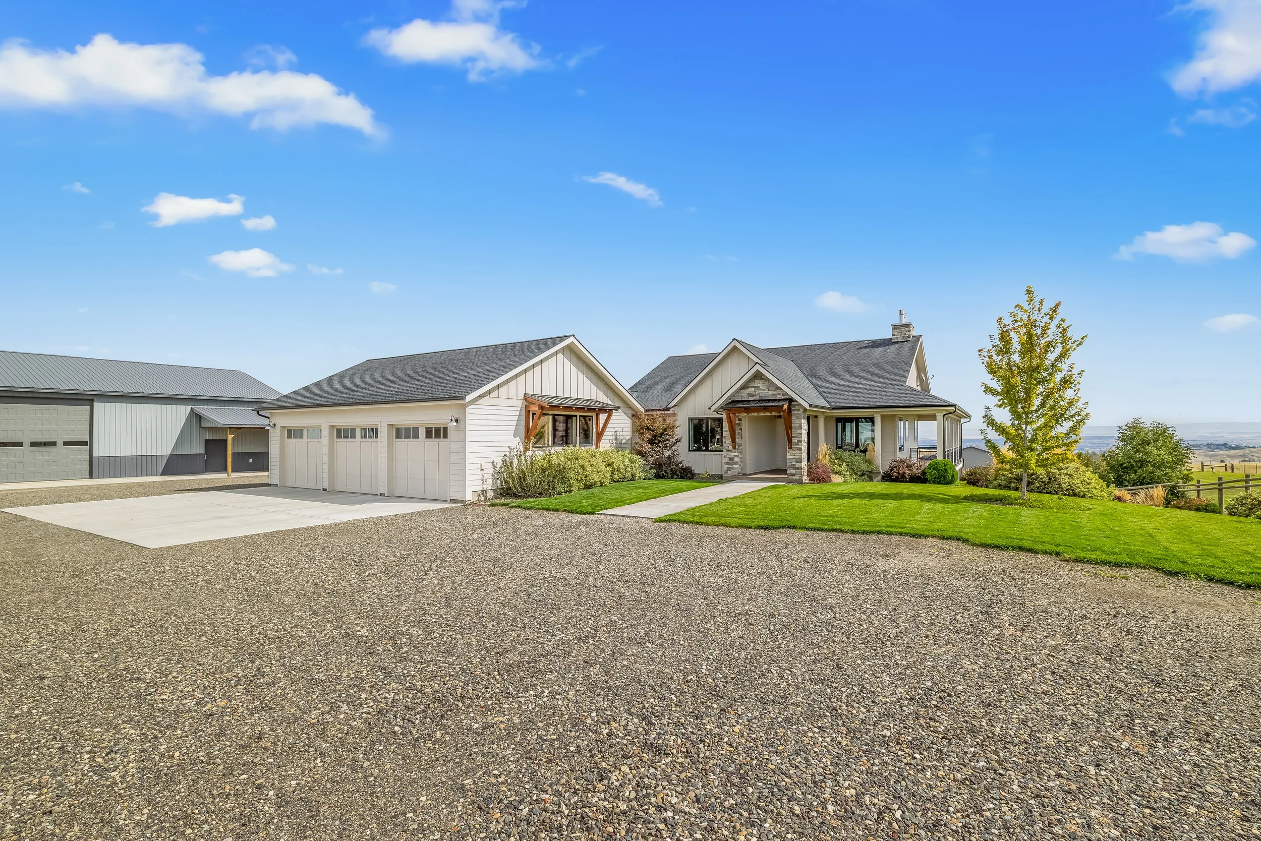 Front exterior and 3-car garage, 1433 Kestrel Dr, Clarkston WA