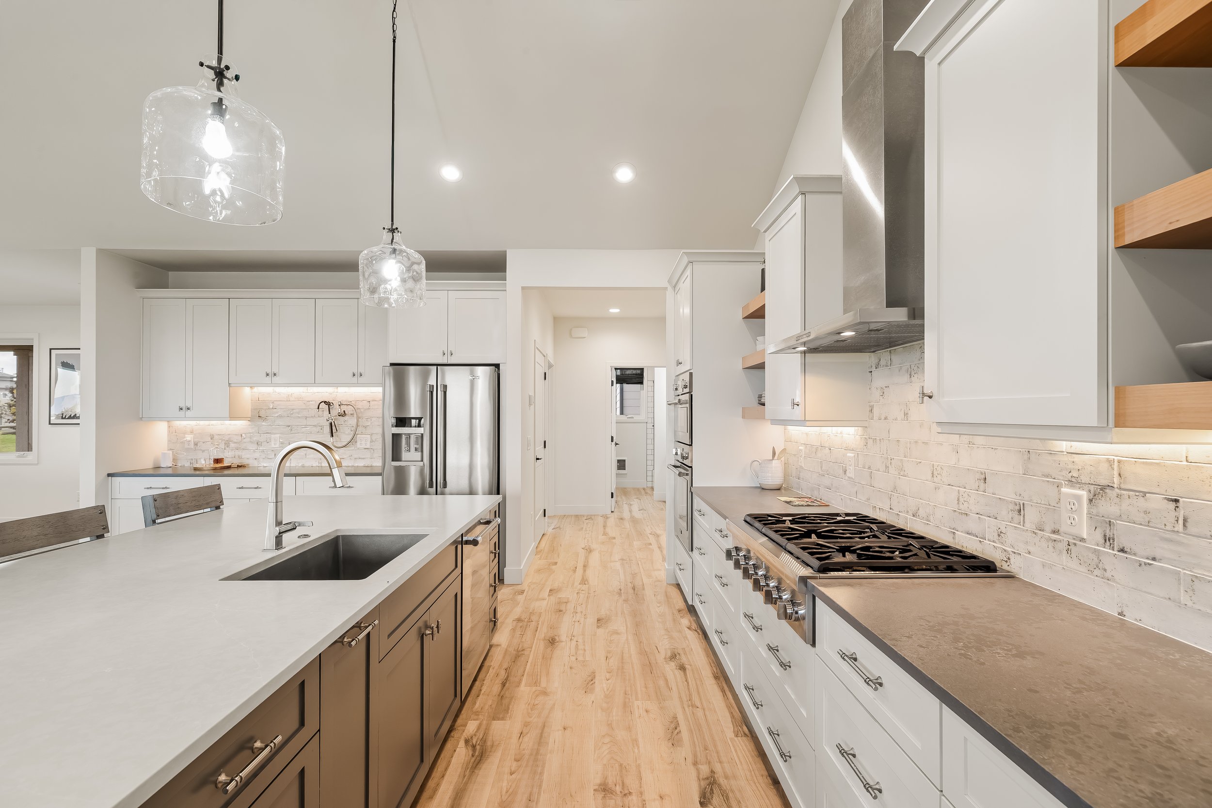 Kitchen sink and quartz island with soft-close cabinets