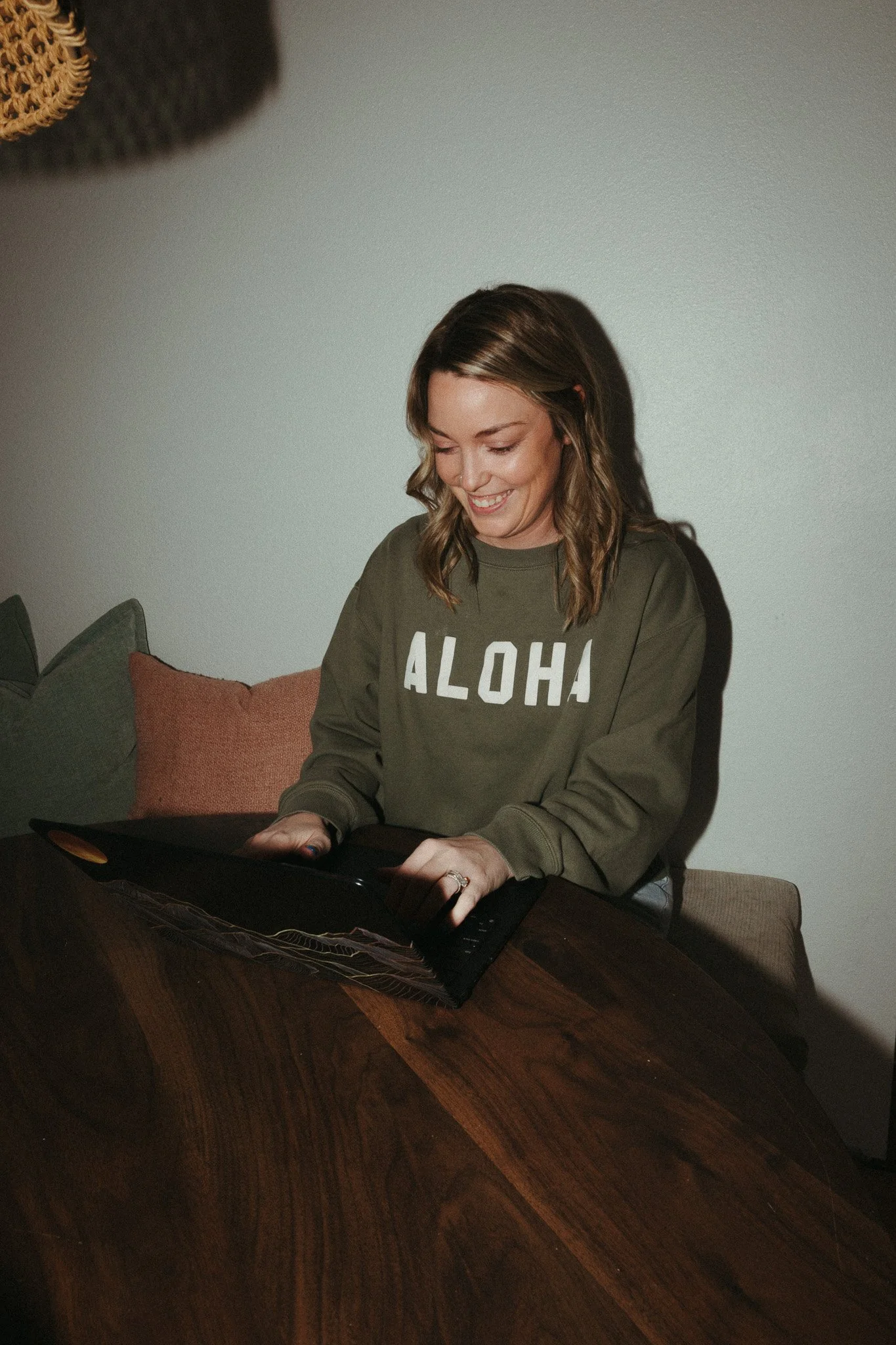 Brittany Babino REALTOR working from her laptop in Lewiston, Idaho.