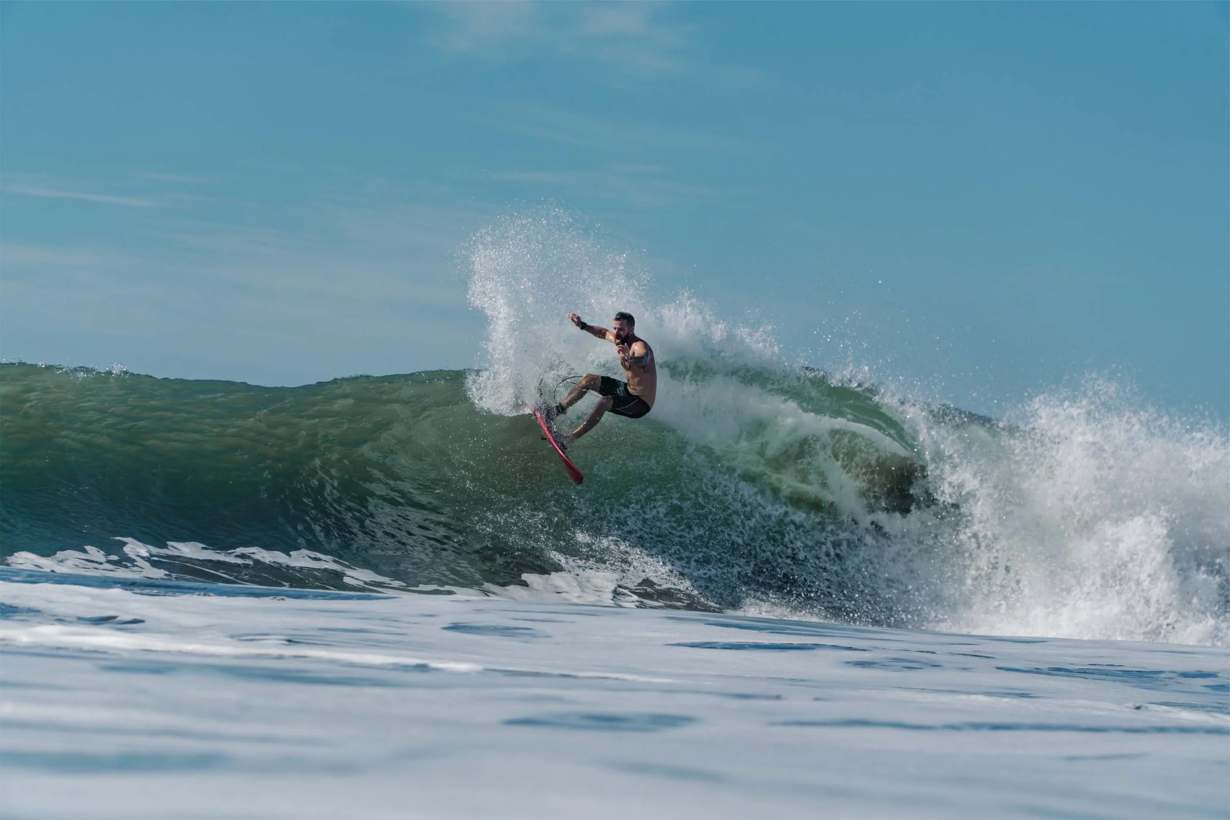power-surf-surfer-whipping-wave.jpg