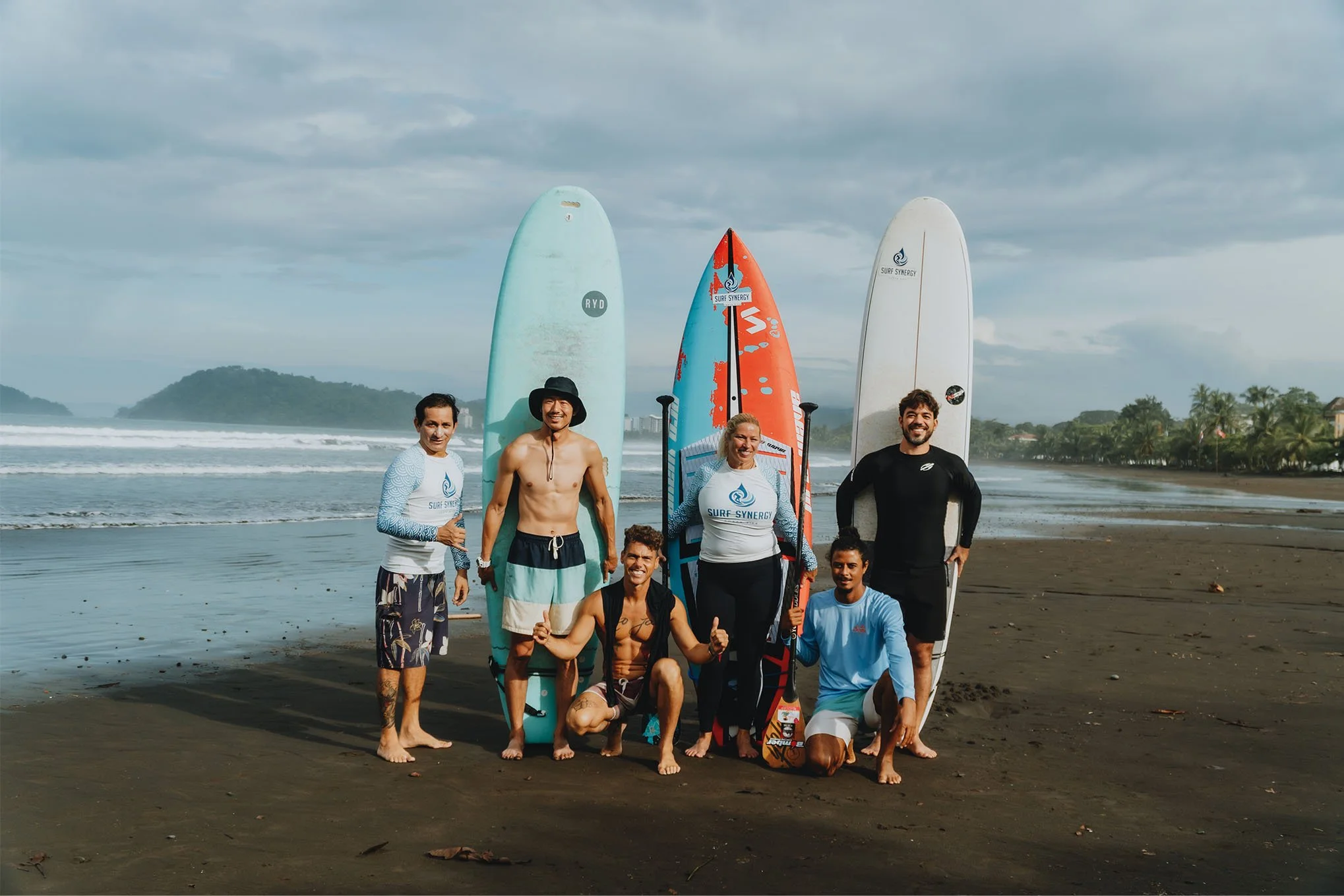 surf-synergy-sup-group-photo-on-costa-rica-beach.jpg