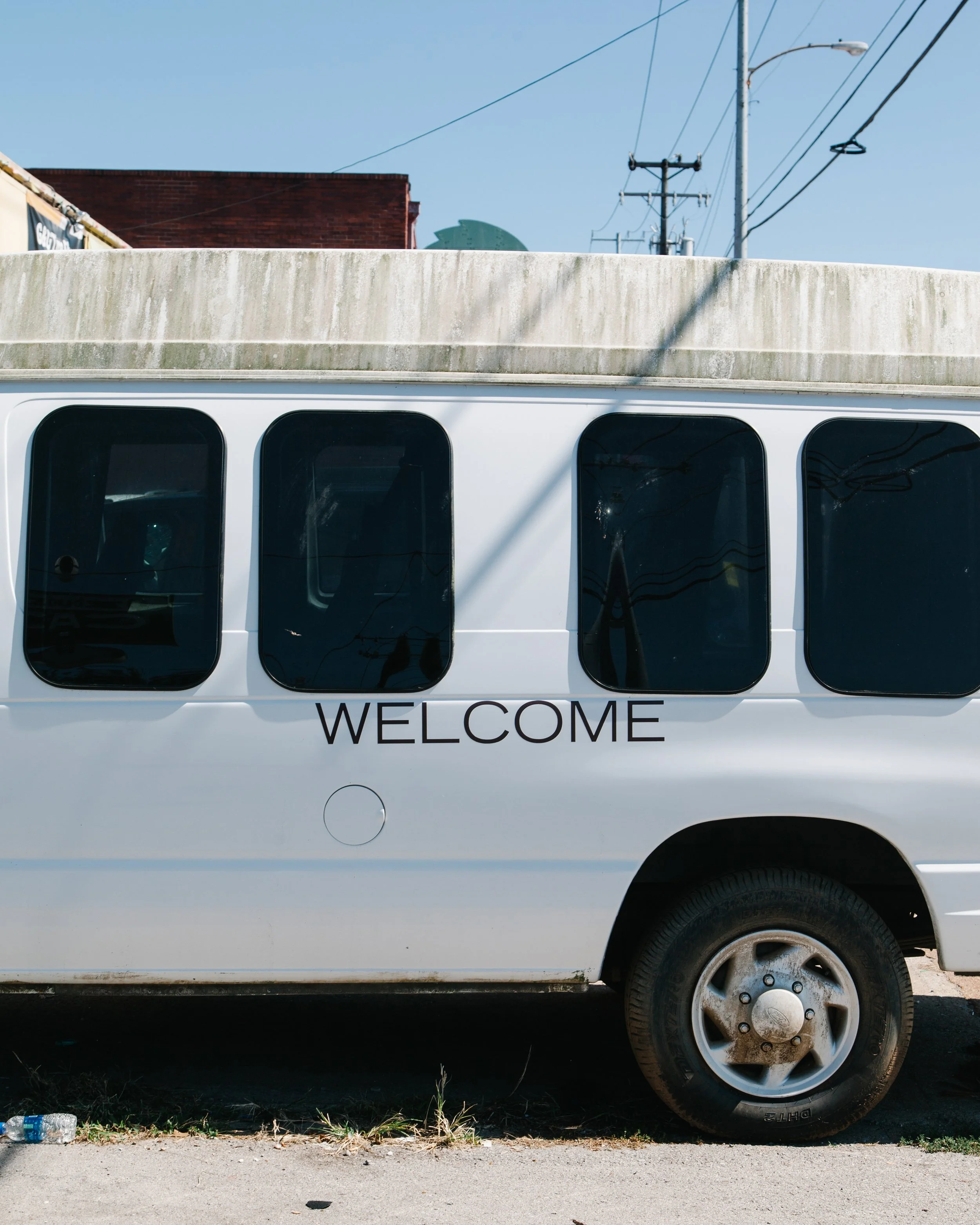 The side of a white van with a 