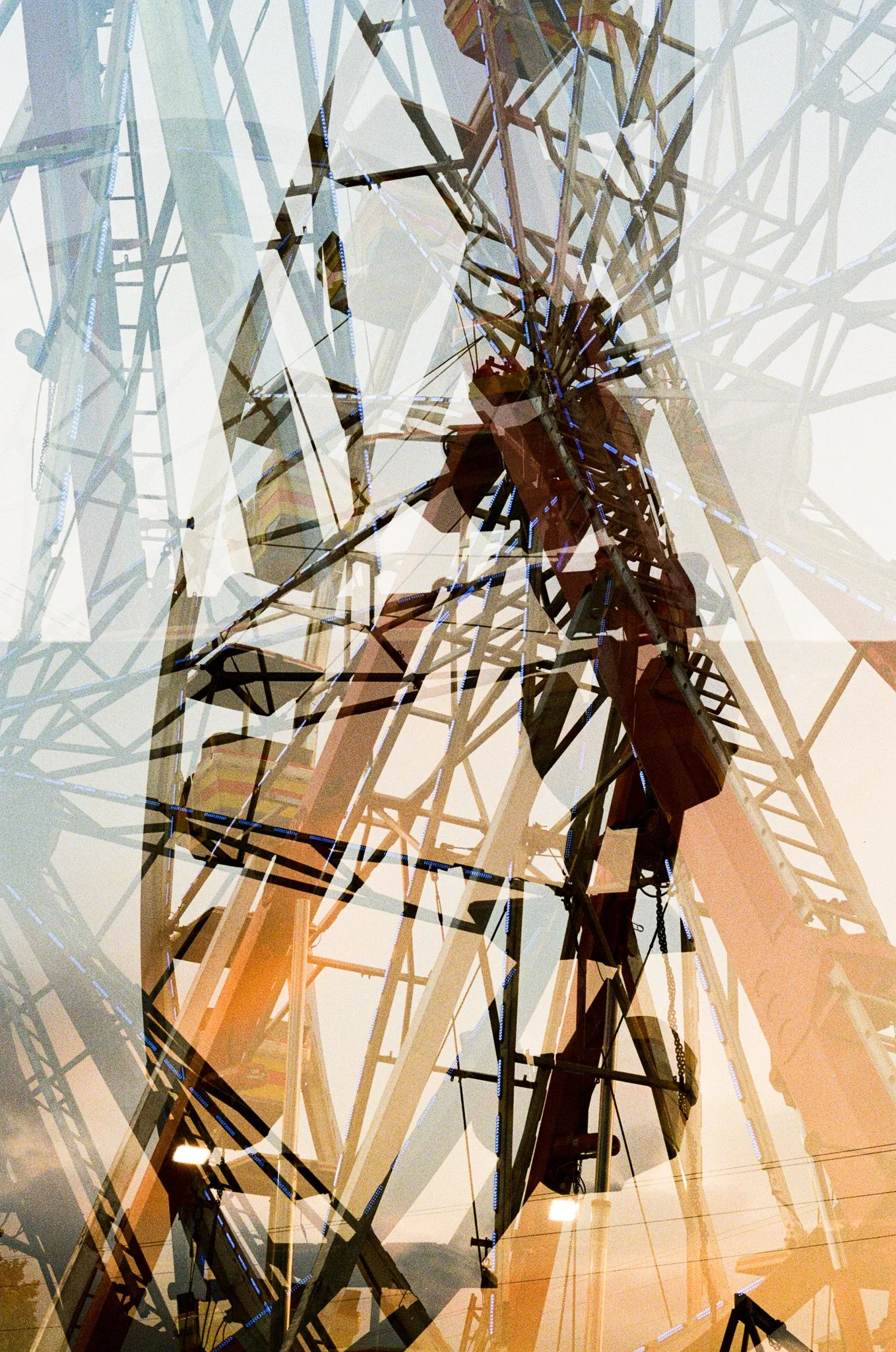 Multiple overlapping images of a Ferris wheel and amusement park rides at dusk, creating a layered, abstract visual effect.
