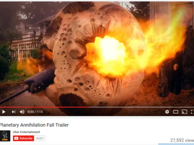 Chainsaw sculptor Tomas Vrba uses a fire torch to burn a finish onto a sculpture.