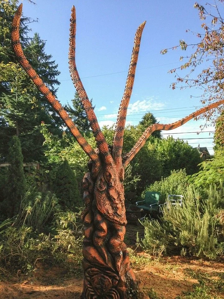 A sculpture of a tree turned into an octopus, at a private home in the Seattle area, created by chainsaw carver and wood sculptor Tomas Vrba of Bellingham.