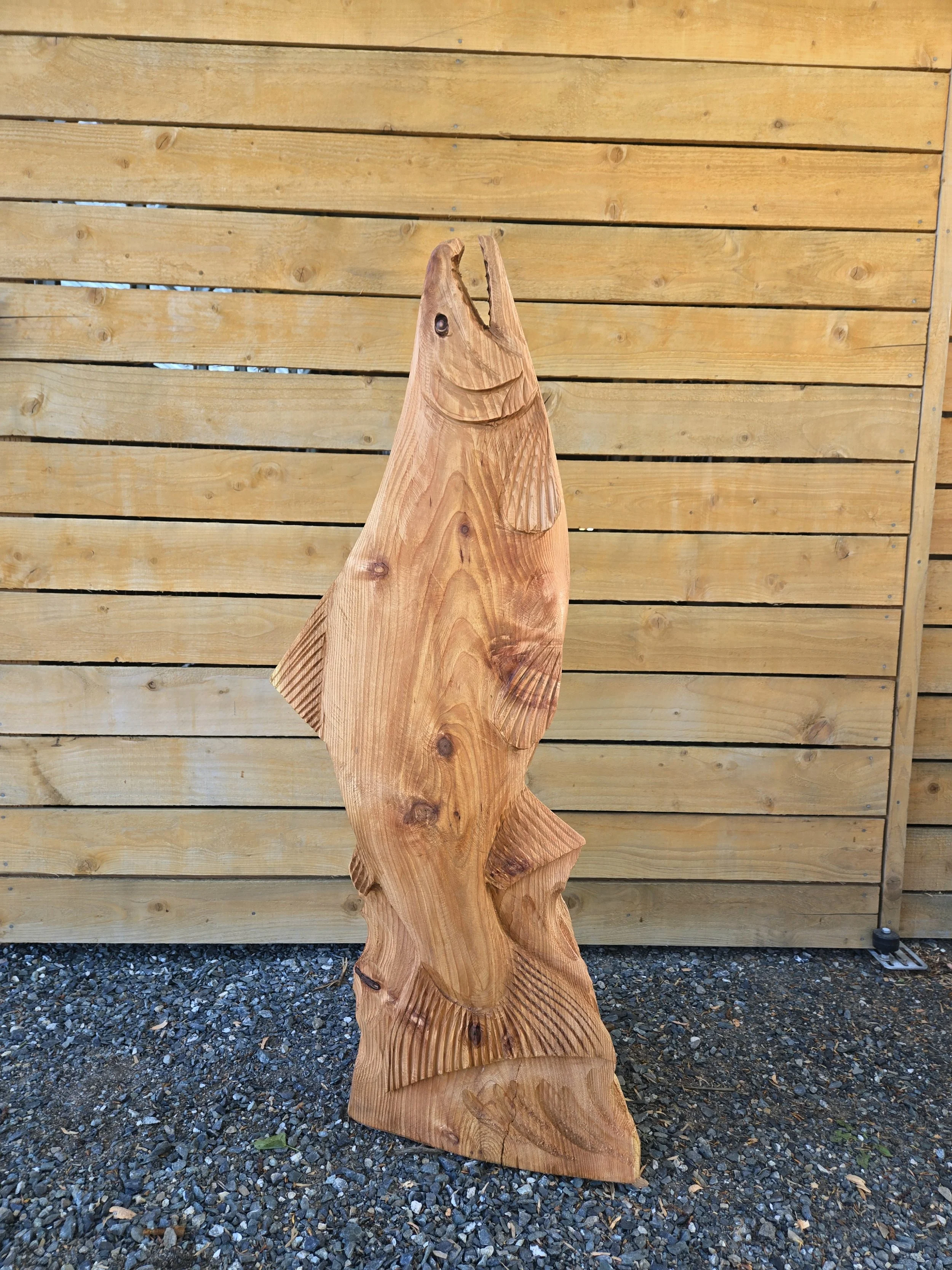 Jumping salmon chainsaw carving