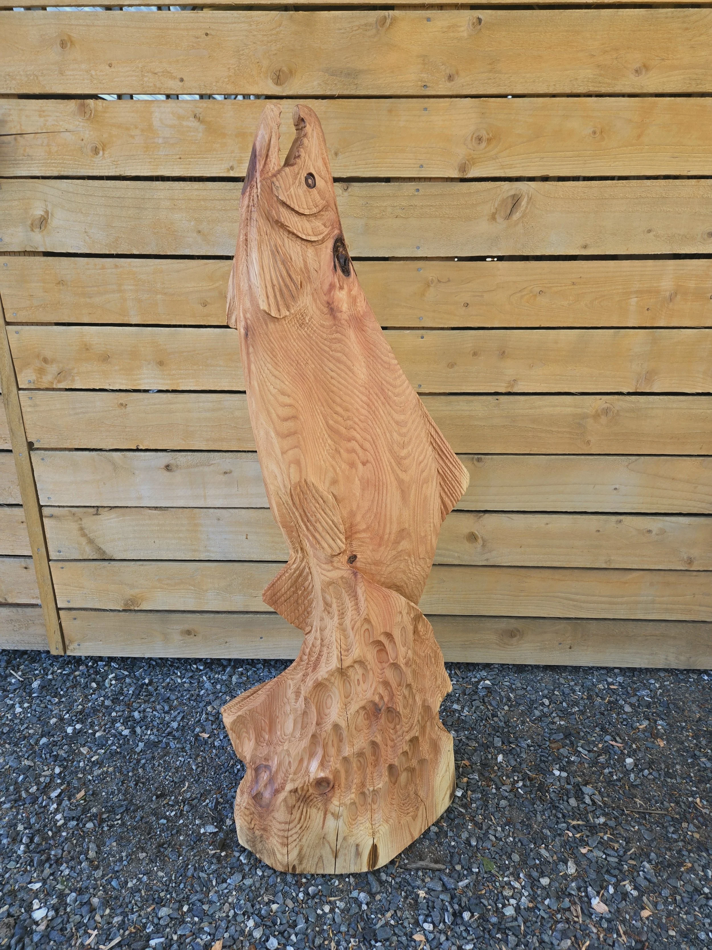 Jumping salmon chainsaw carving