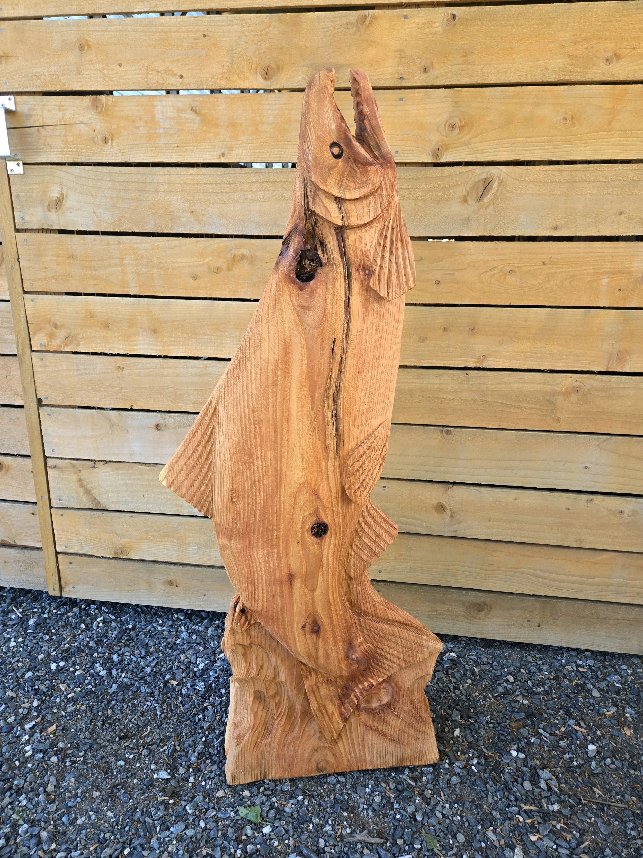 Jumping salmon chainsaw carving