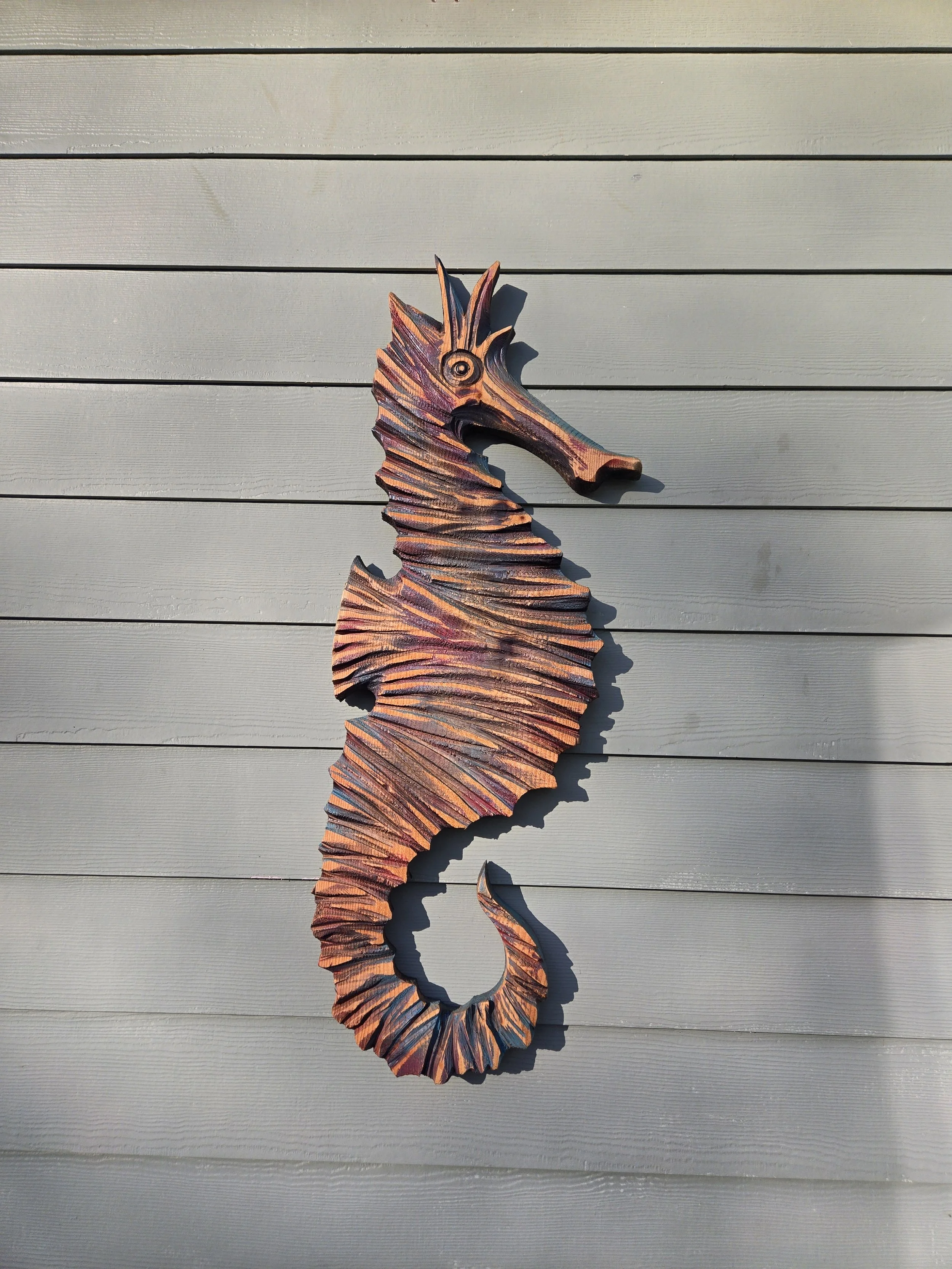 seahorse chainsaw carving whimsical