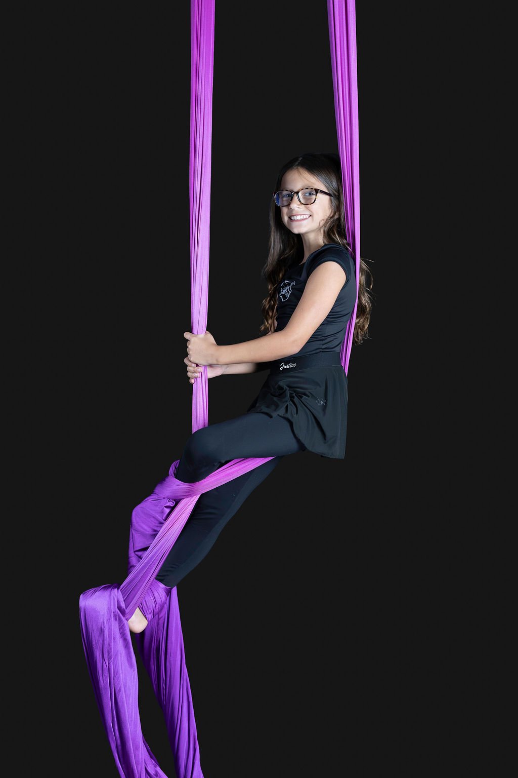 Mila showing off her radiant smile and picture-perfect wings on aerial silks🦋

Captured beautifully by @alexannphoto