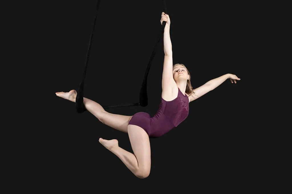 Allie L💜VES exploring new apparatuses, this creativity has driven her to discover silks, sling, lyra, cube, and trapeze! Next month, she will be competing at the Black Hills Aerial Cup in both the lyra and specialty apparatus category. We are so exc