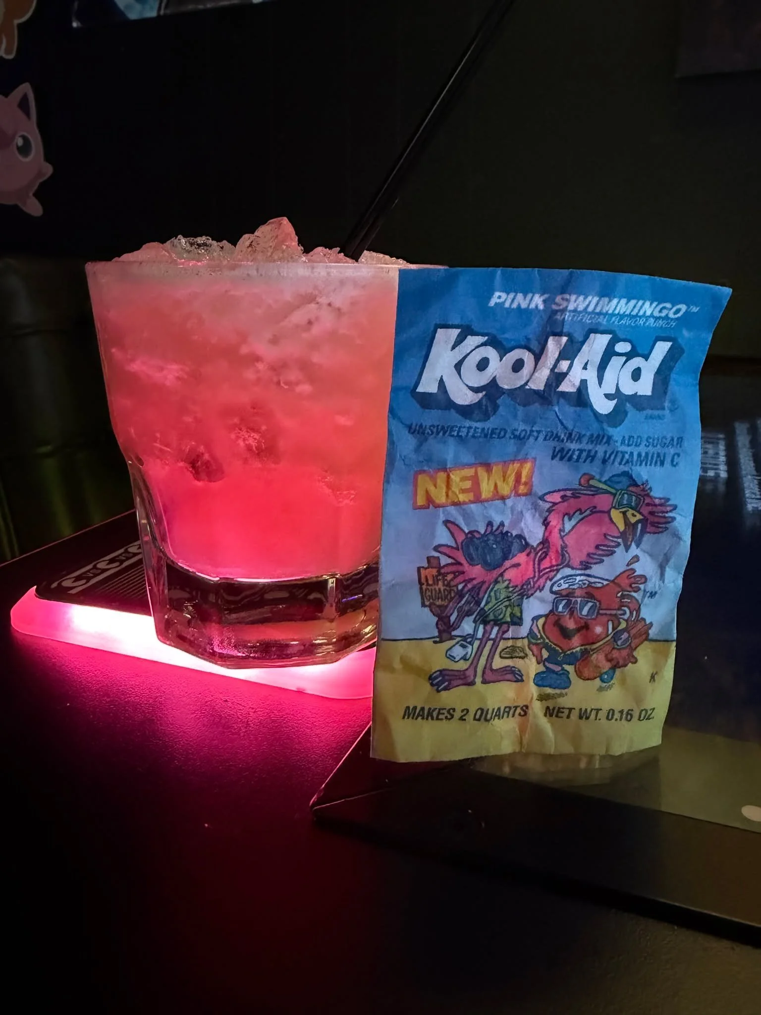 Check out our  Pink Swimmingo!  This tequila and watermelon combo will take you back to the days of summer vacation. You are never too old for a Kool-aid inspired cocktail. Try it tonight at The Warp Zone!