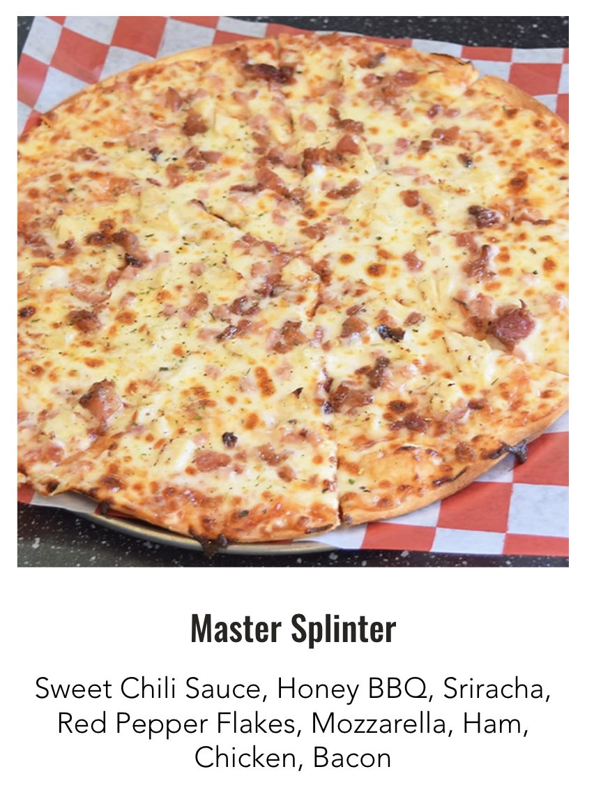 A large pizza with cheese, ham, chicken, bacon, and spice bits, served on a checkered paper-lined tray.