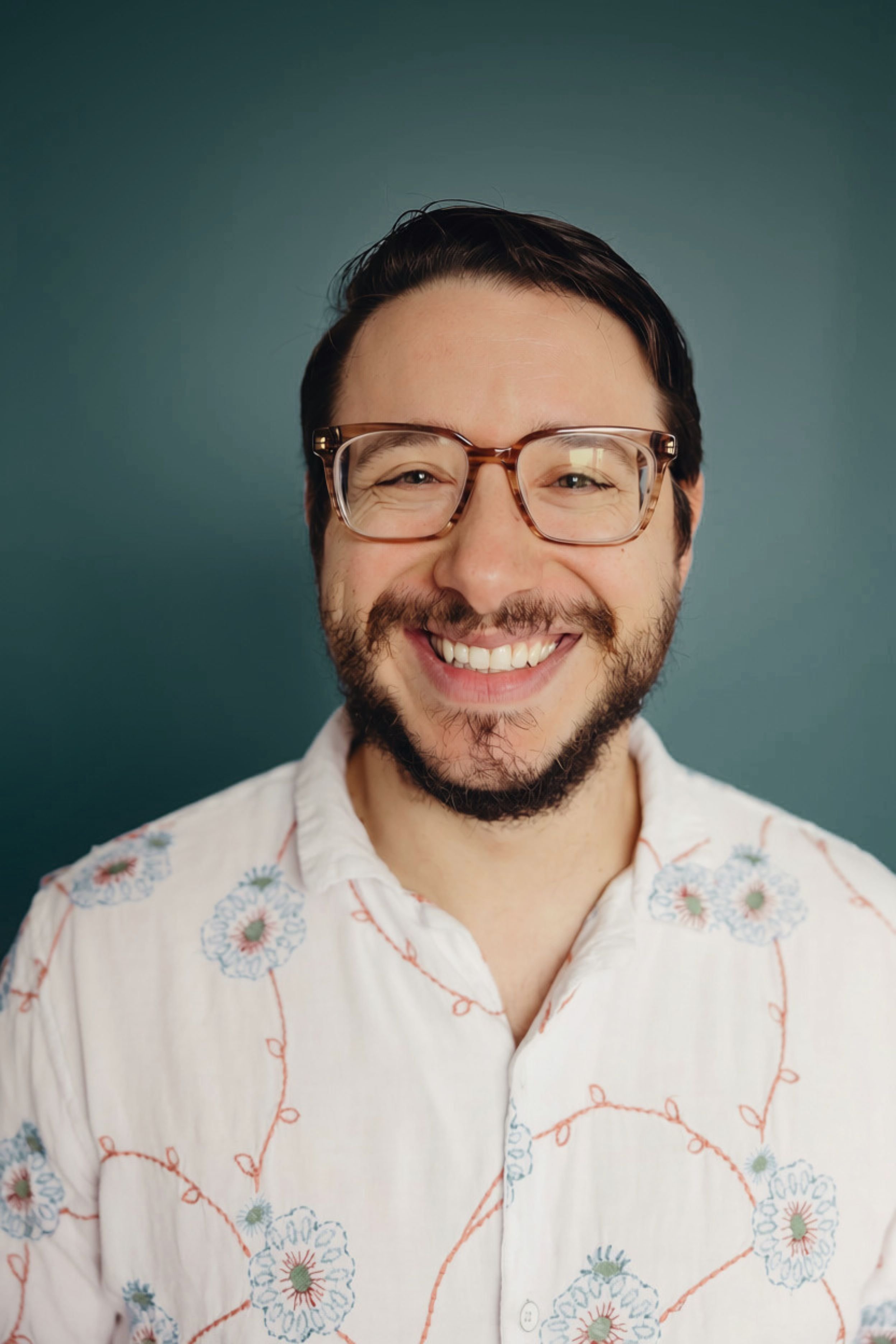 man smiling, intern on team