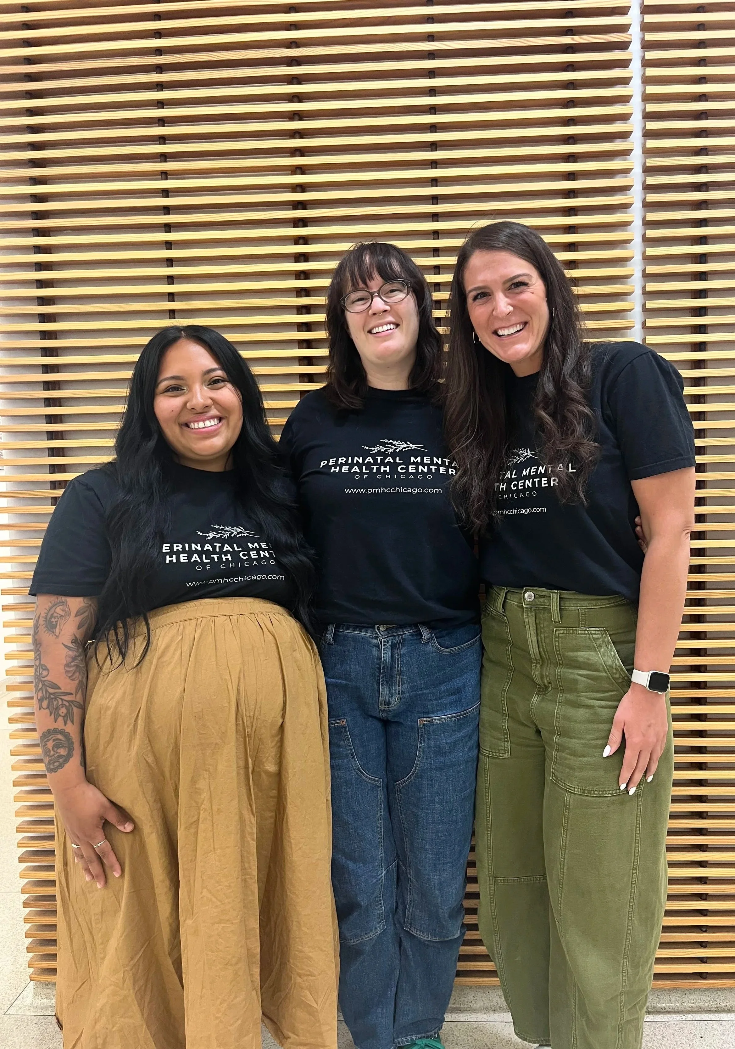 3 of the 4 members of PMHC Chicago celebrating a beautiful free community event