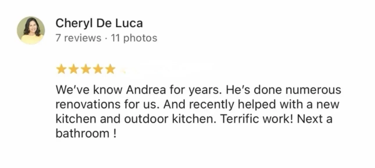 Screenshot of a customer review for Andrea, expressing satisfaction with renovations including a kitchen, outdoor kitchen, and bathroom, written by Cheryl De Luca.